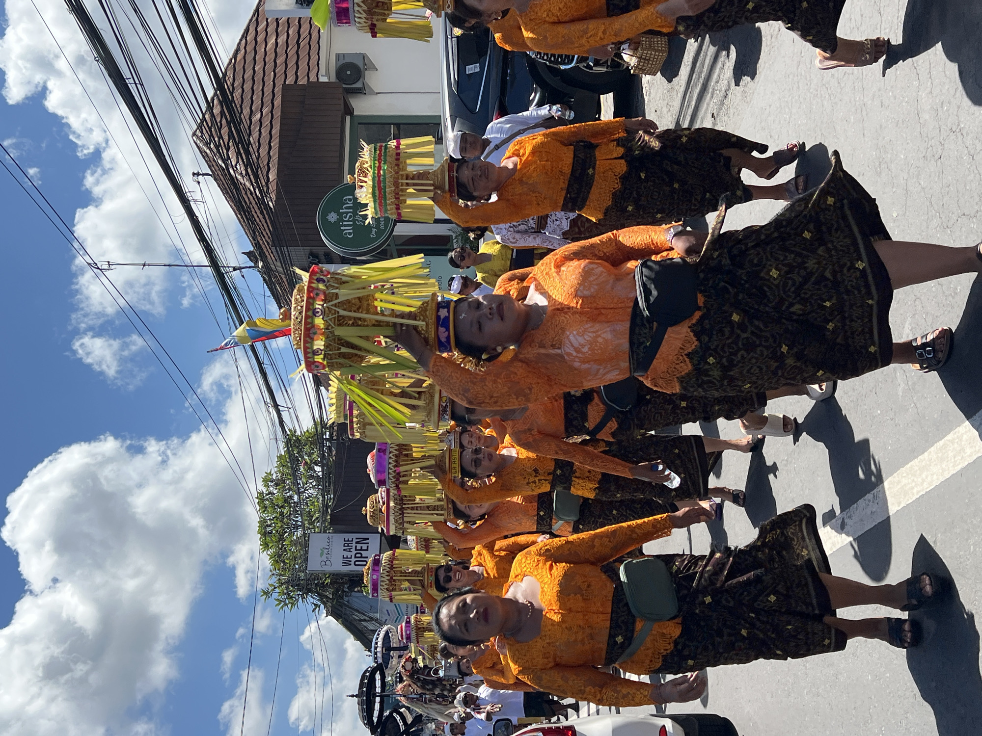 Traditional Balinese religious procession fills Ubud streets with ceremonial participants