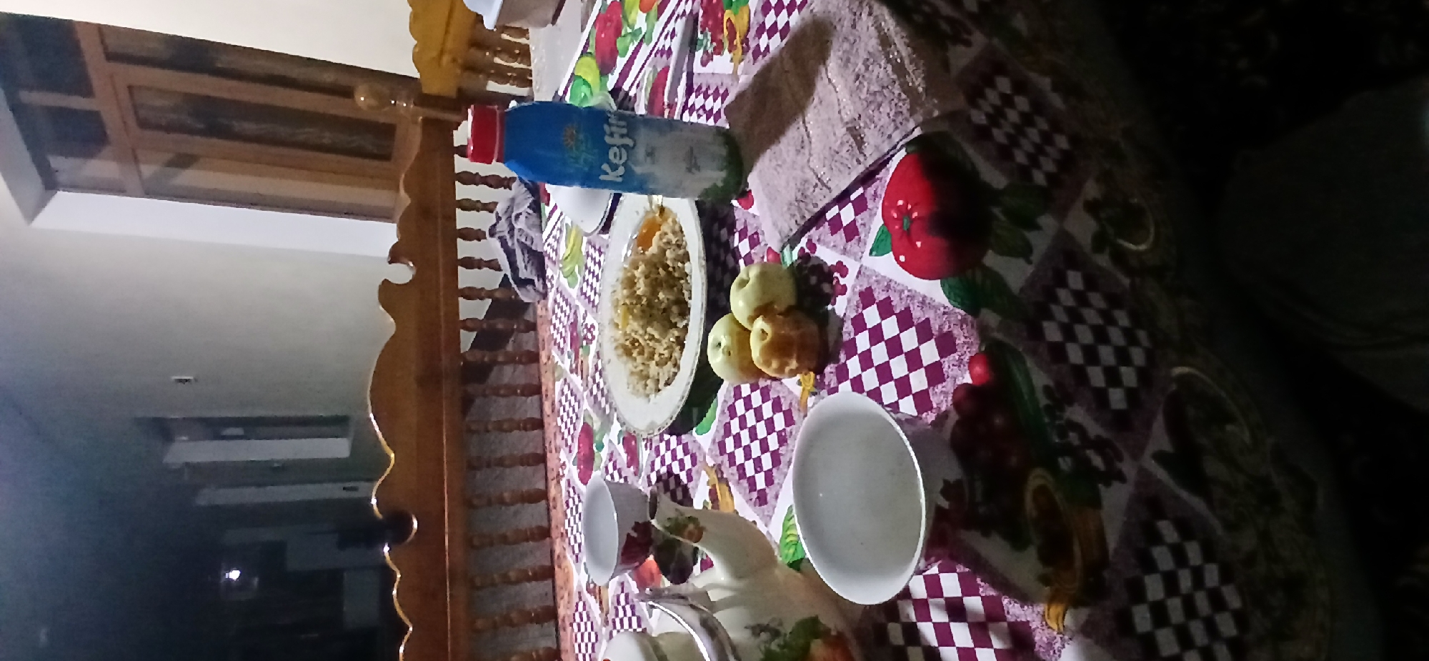 Relaxed mealtime at a home table in Andijani, Uzbekistan
