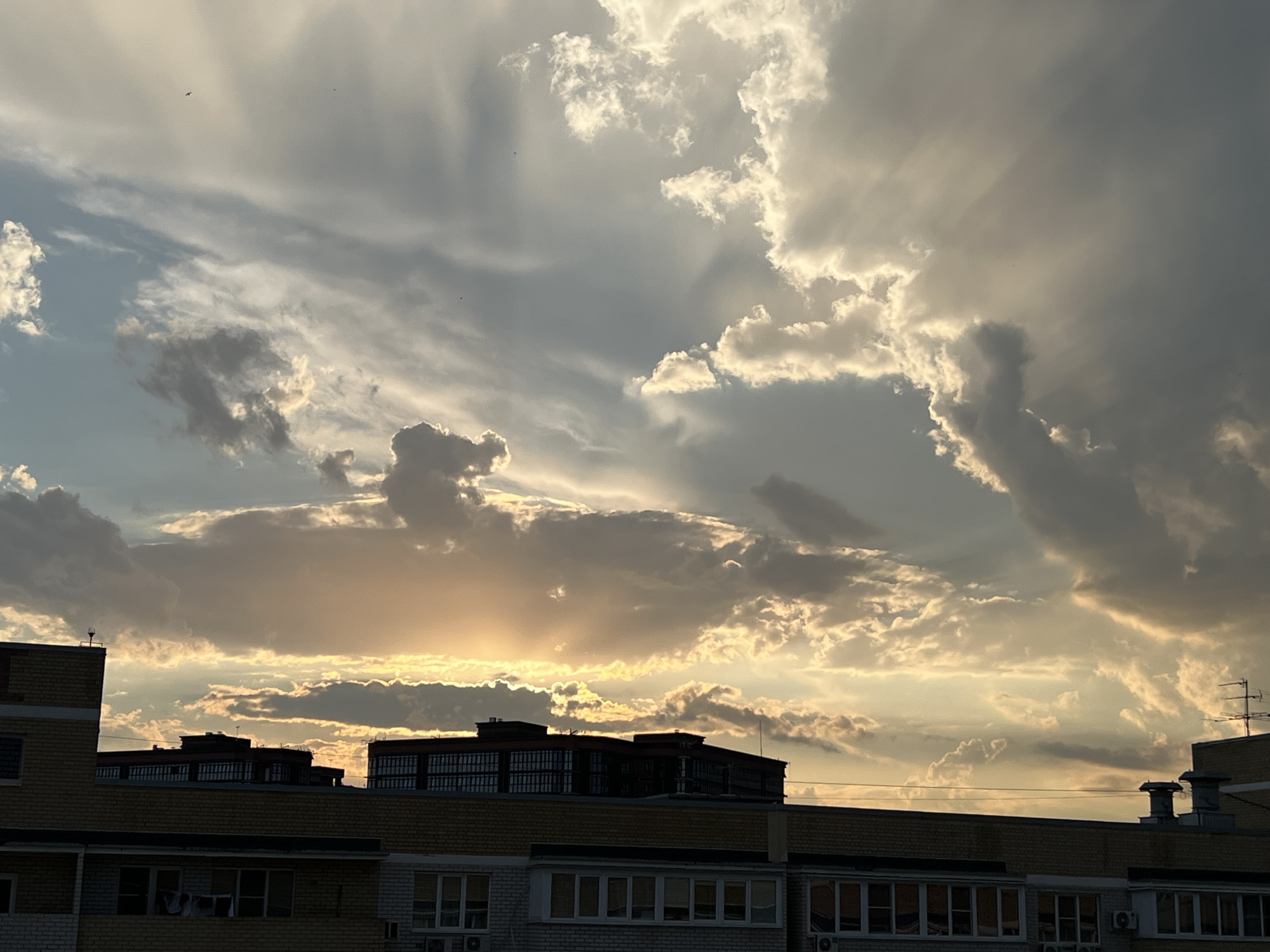 Golden sunset breaks through storm clouds over Krasnodar