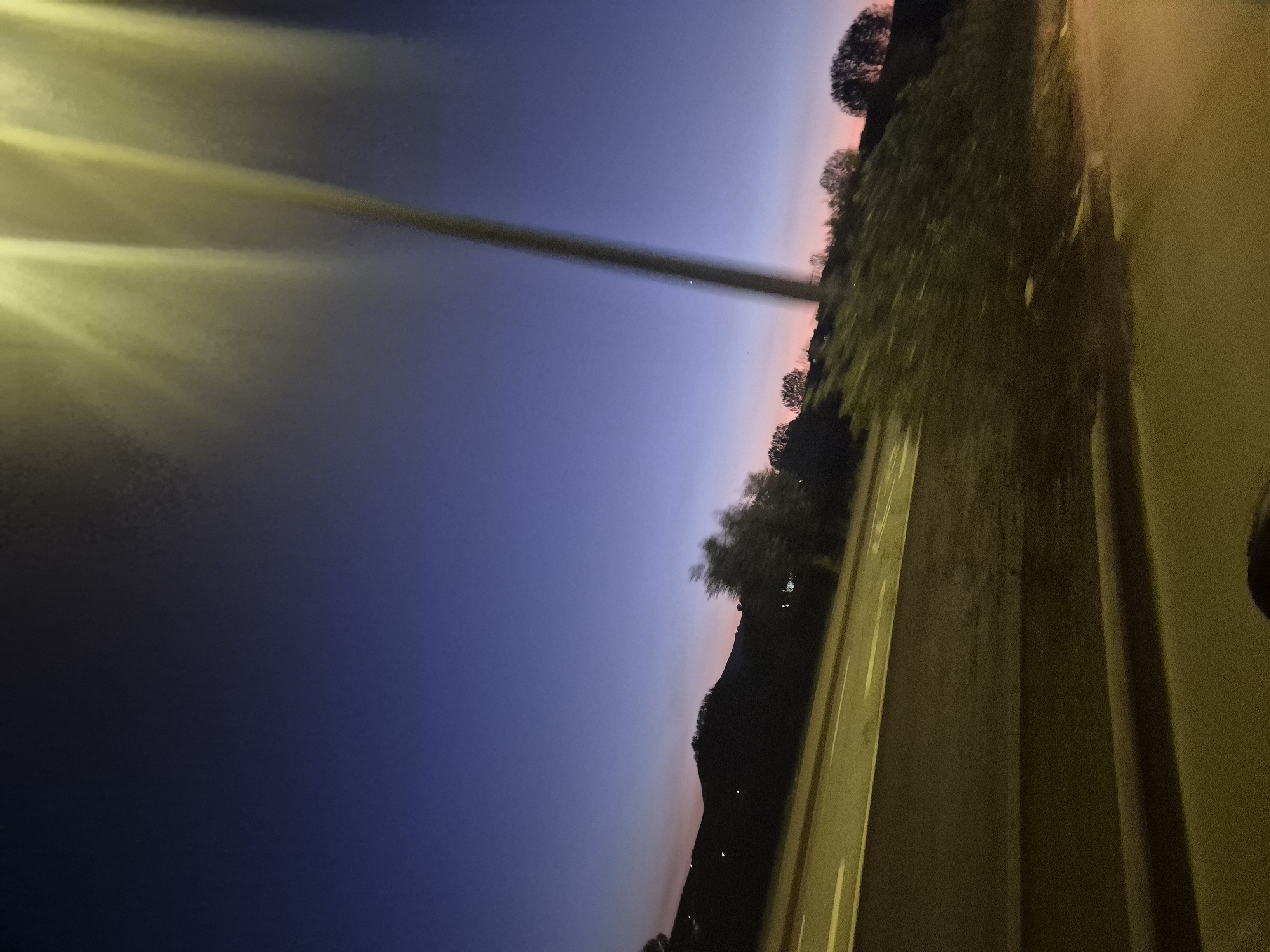 Evening drive through Mirandela captures twilight sky transition