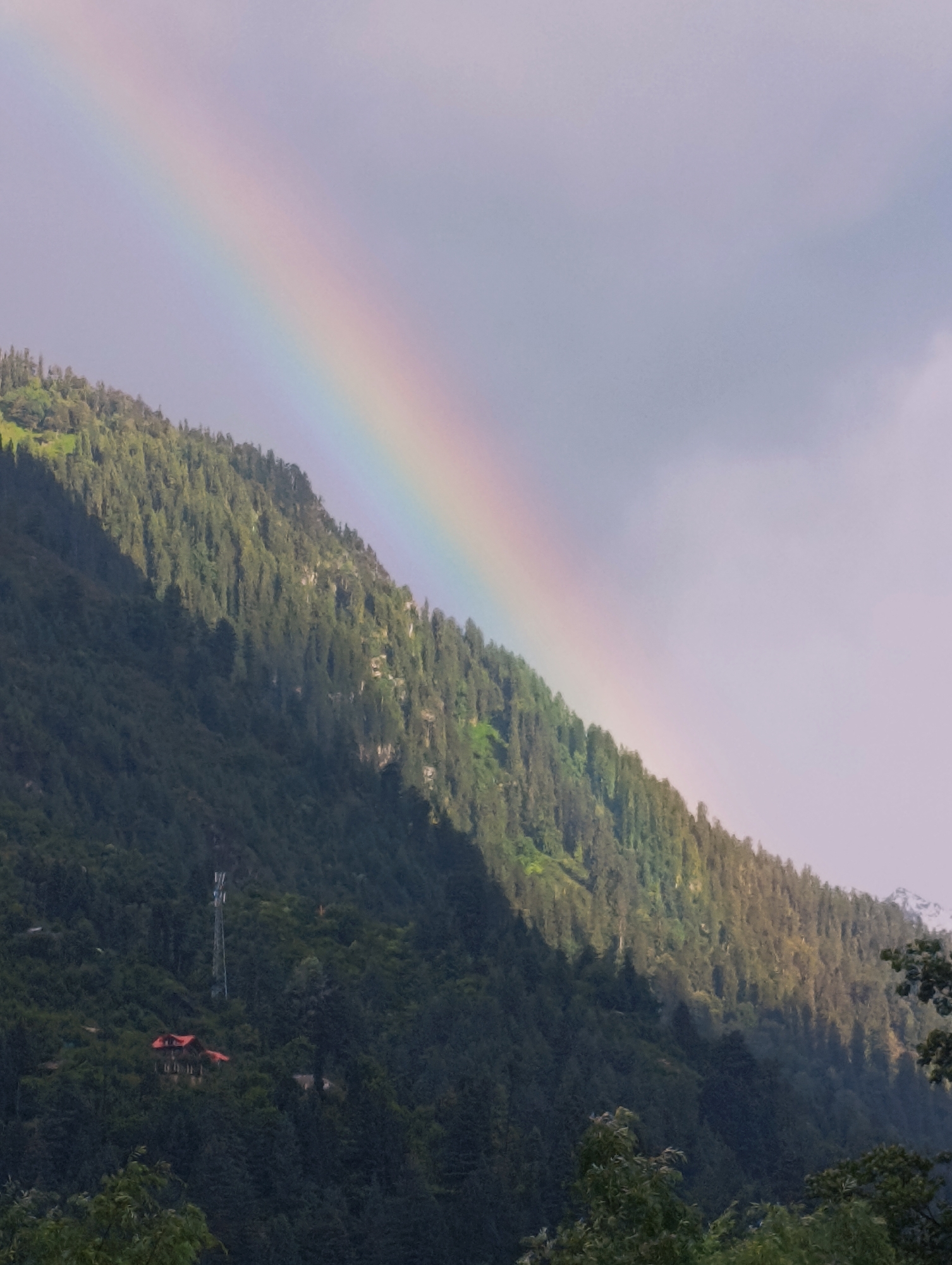 Rainbow over Himalayan mountains near Bahang, India