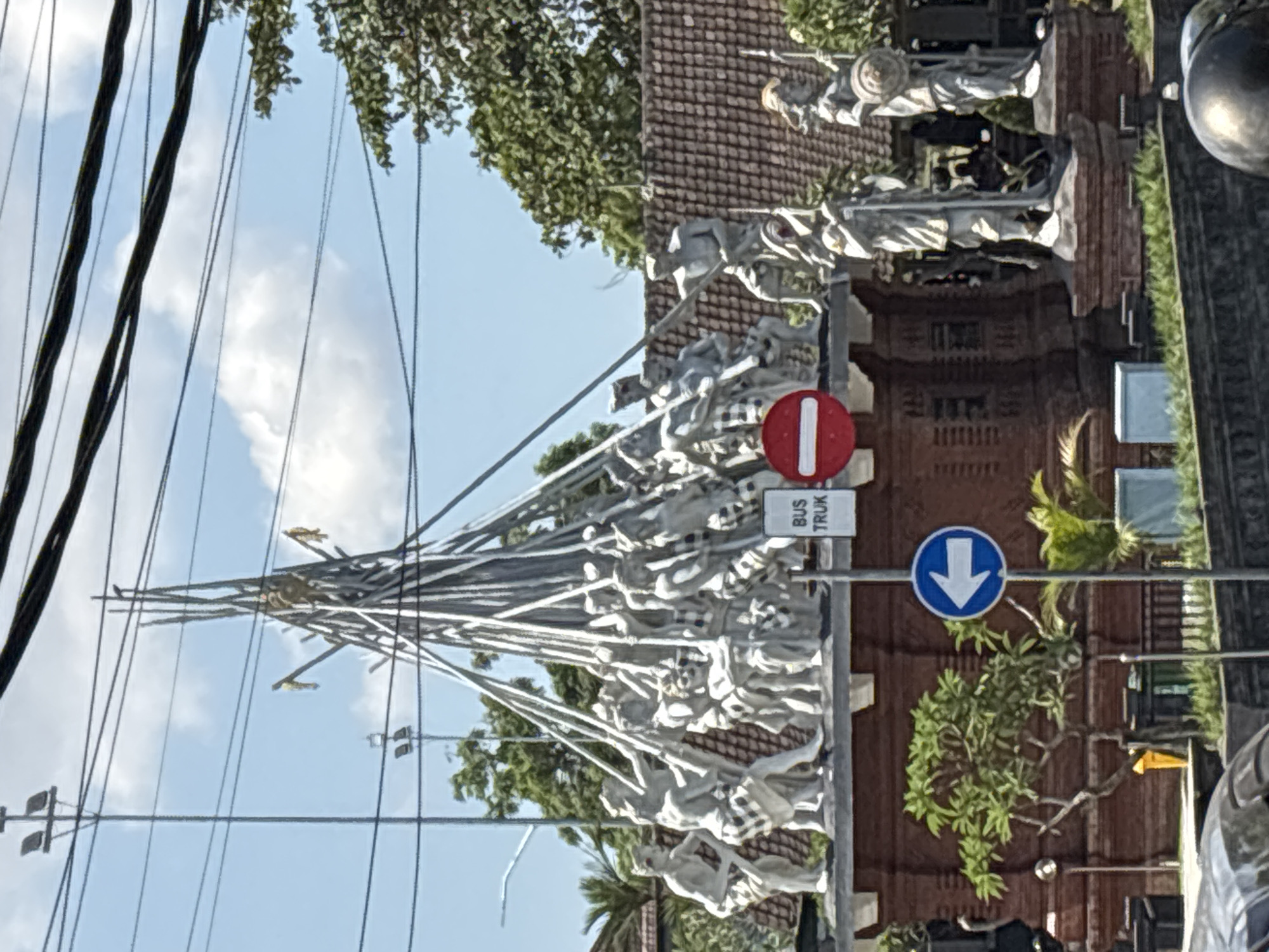 White statue structure and astronaut food mural spotted in Mengwi