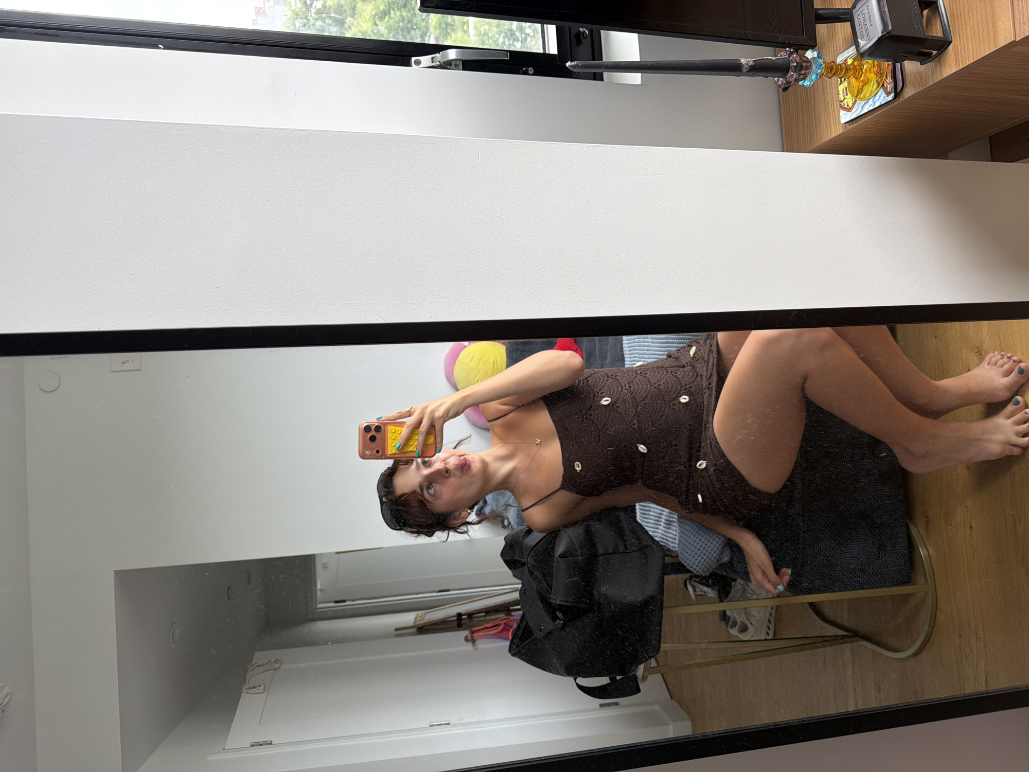 Mirror selfie in a brown crochet dress, New York