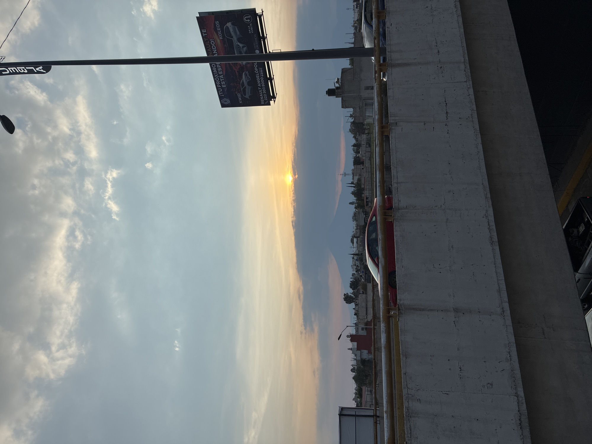 Sunset captured from bridge overpass in Tlaxcalancingo, Mexico