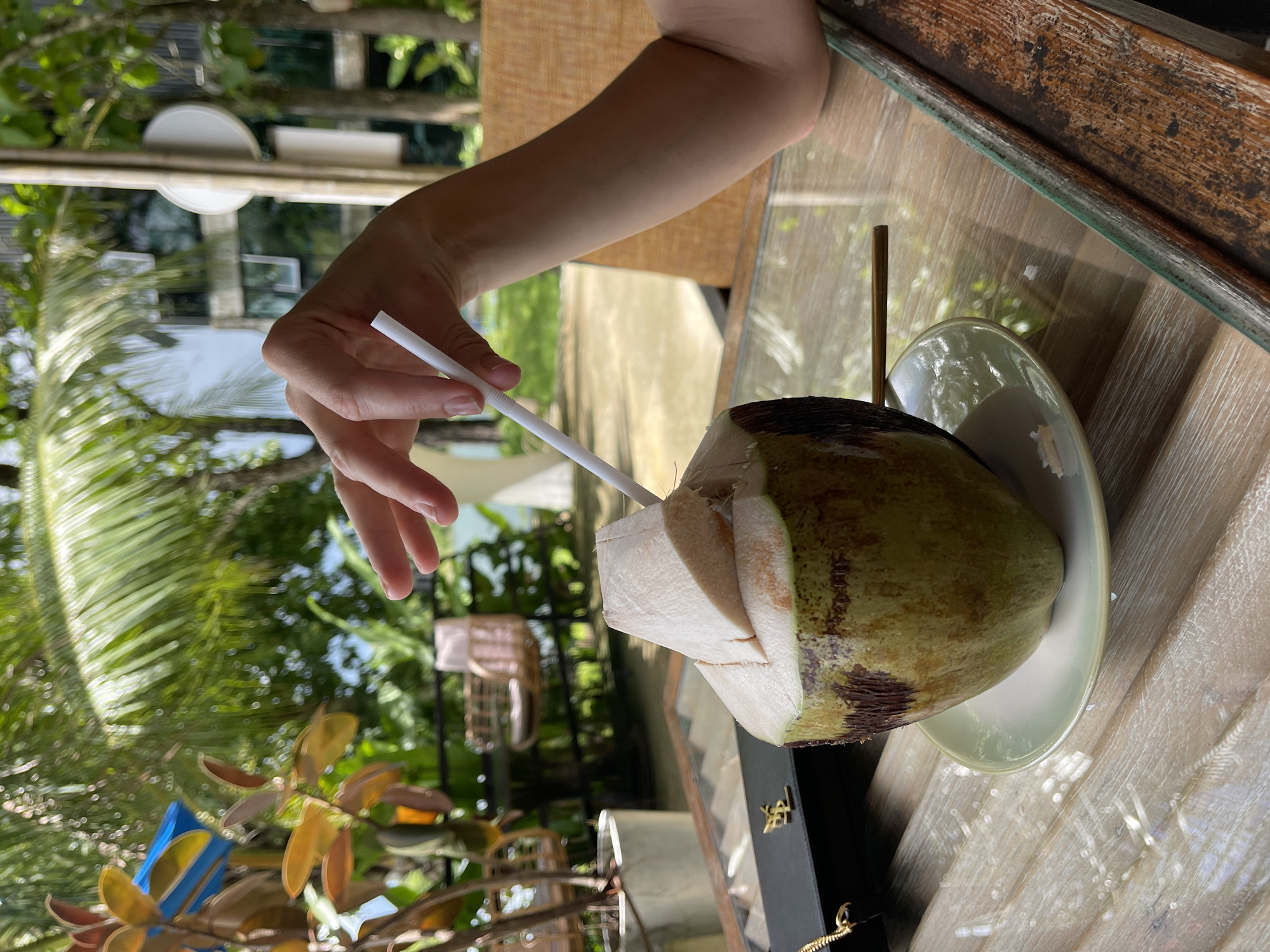 Drinks and downtime at a waterside café in Si Sunthon
