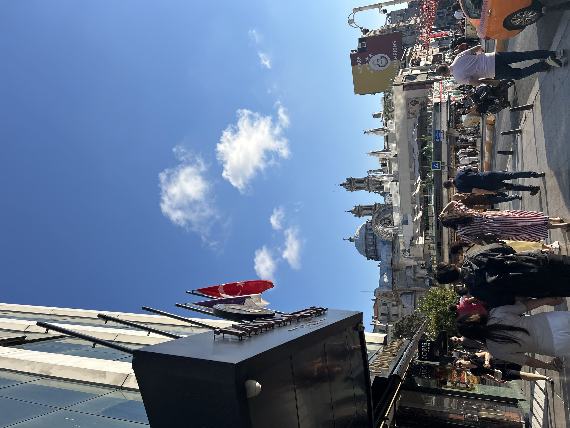 Sunny afternoon street life captured across Beyoğlu district Istanbul