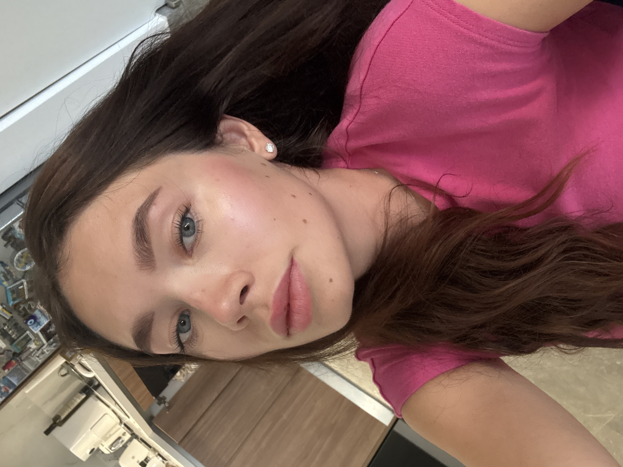 Woman takes selfie in pink shirt, Cyprus