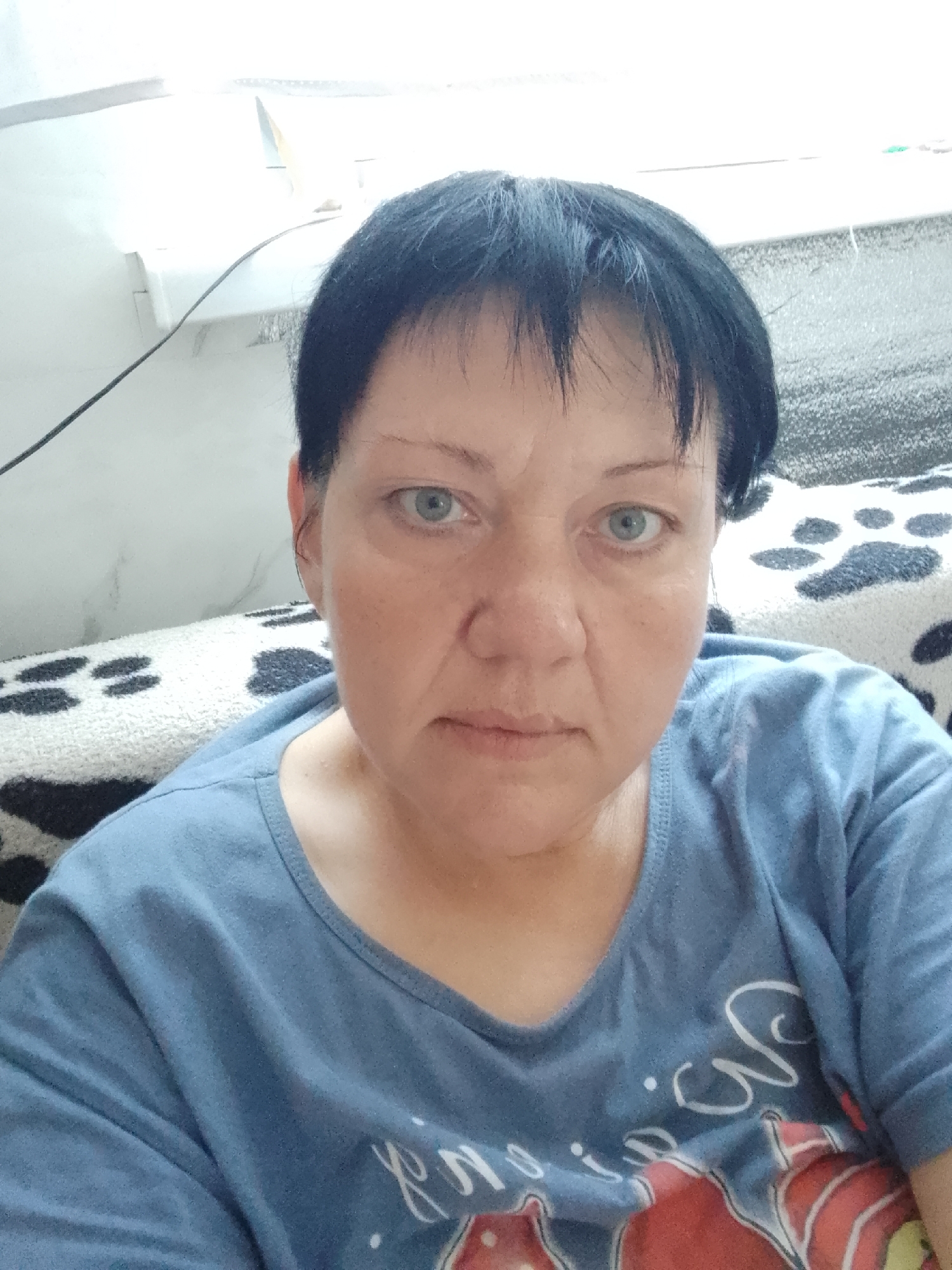 Indoor selfie on a paw print sofa in Pugachyov