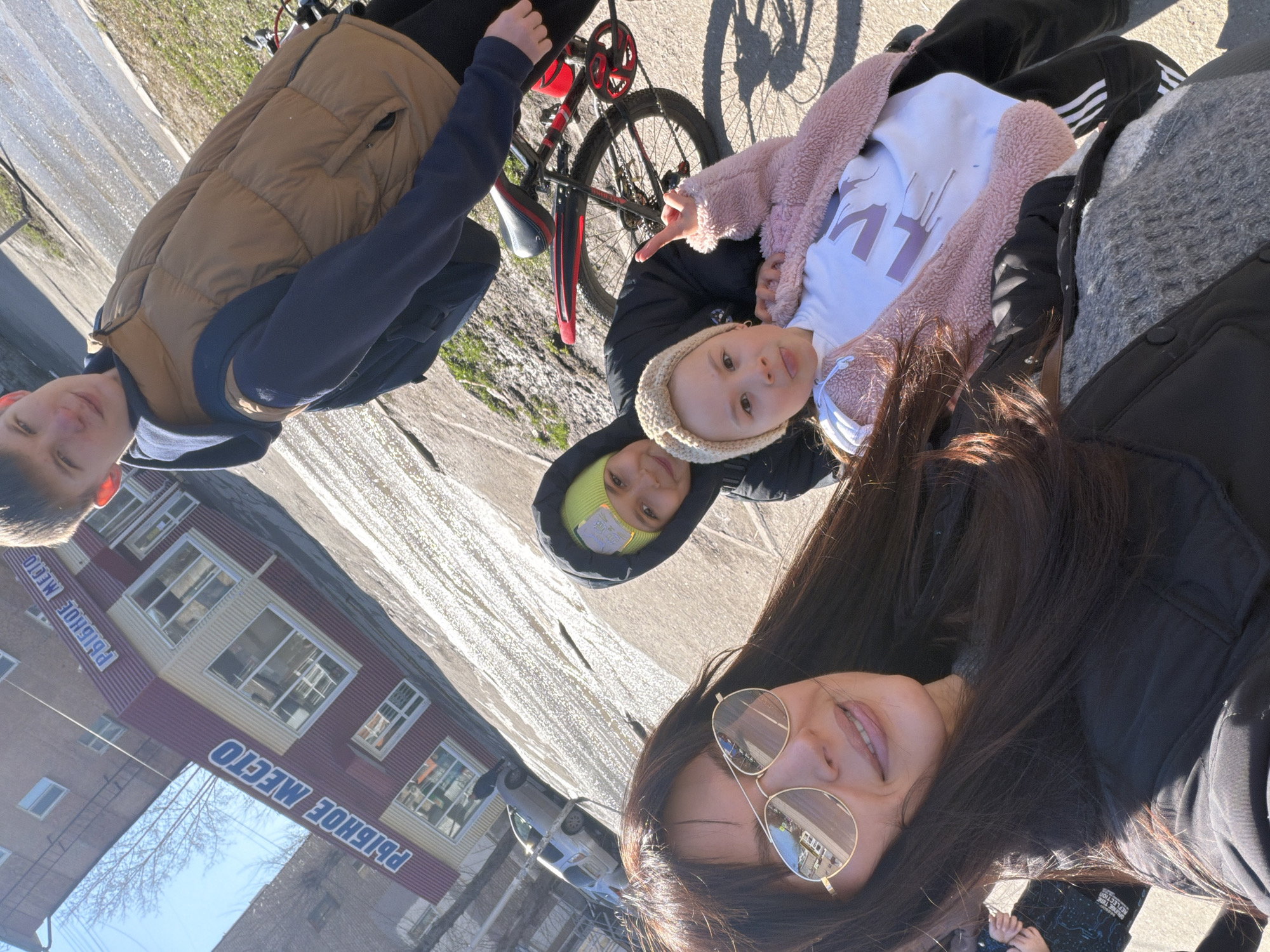 Family selfies captured during sunny morning in snowy Perm