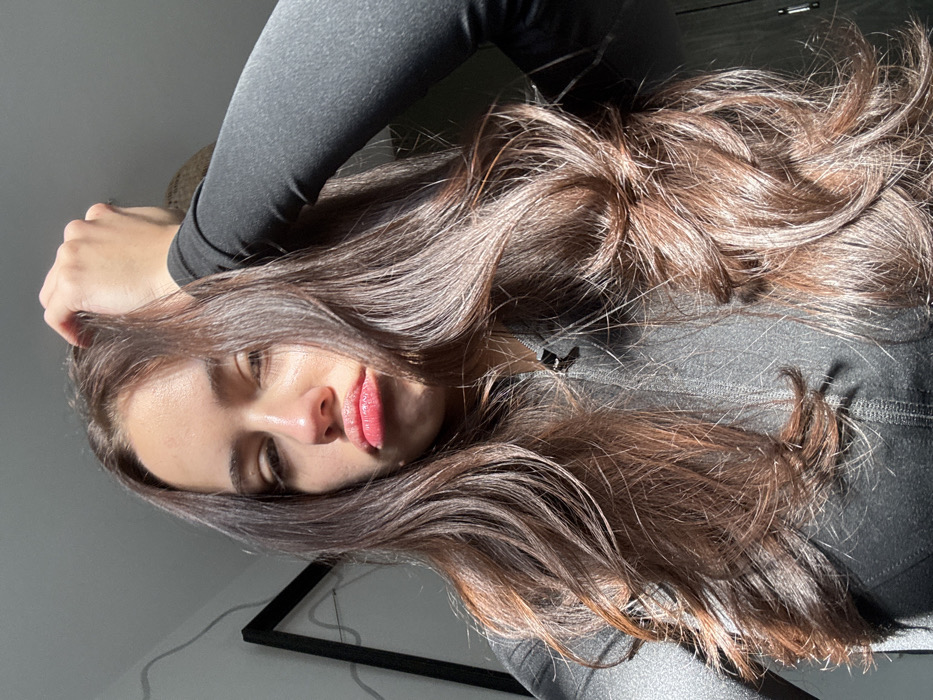 Woman photographed indoors during morning hours in Tel Aviv