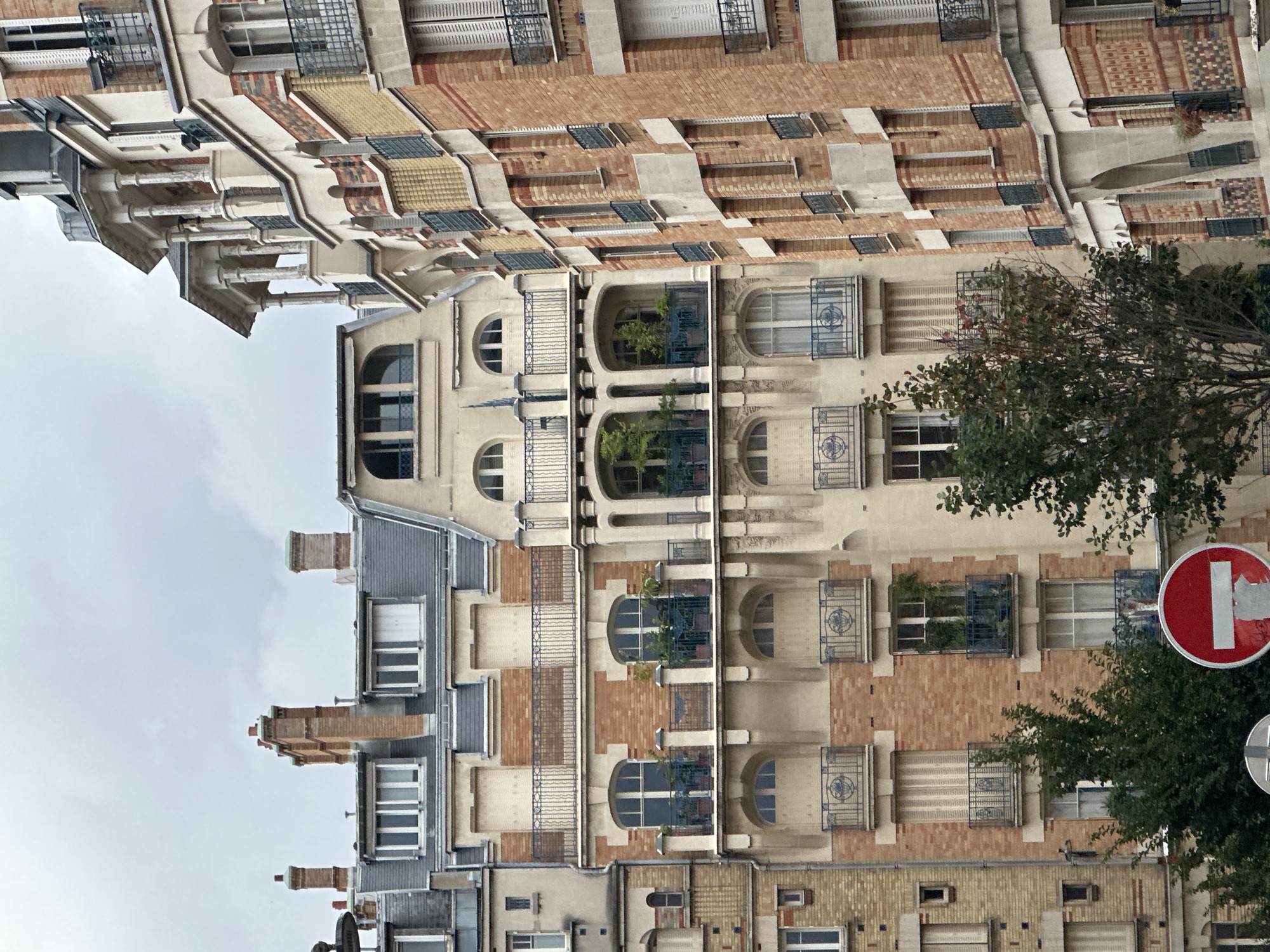 Paris street architecture and a very relaxed tabby cat