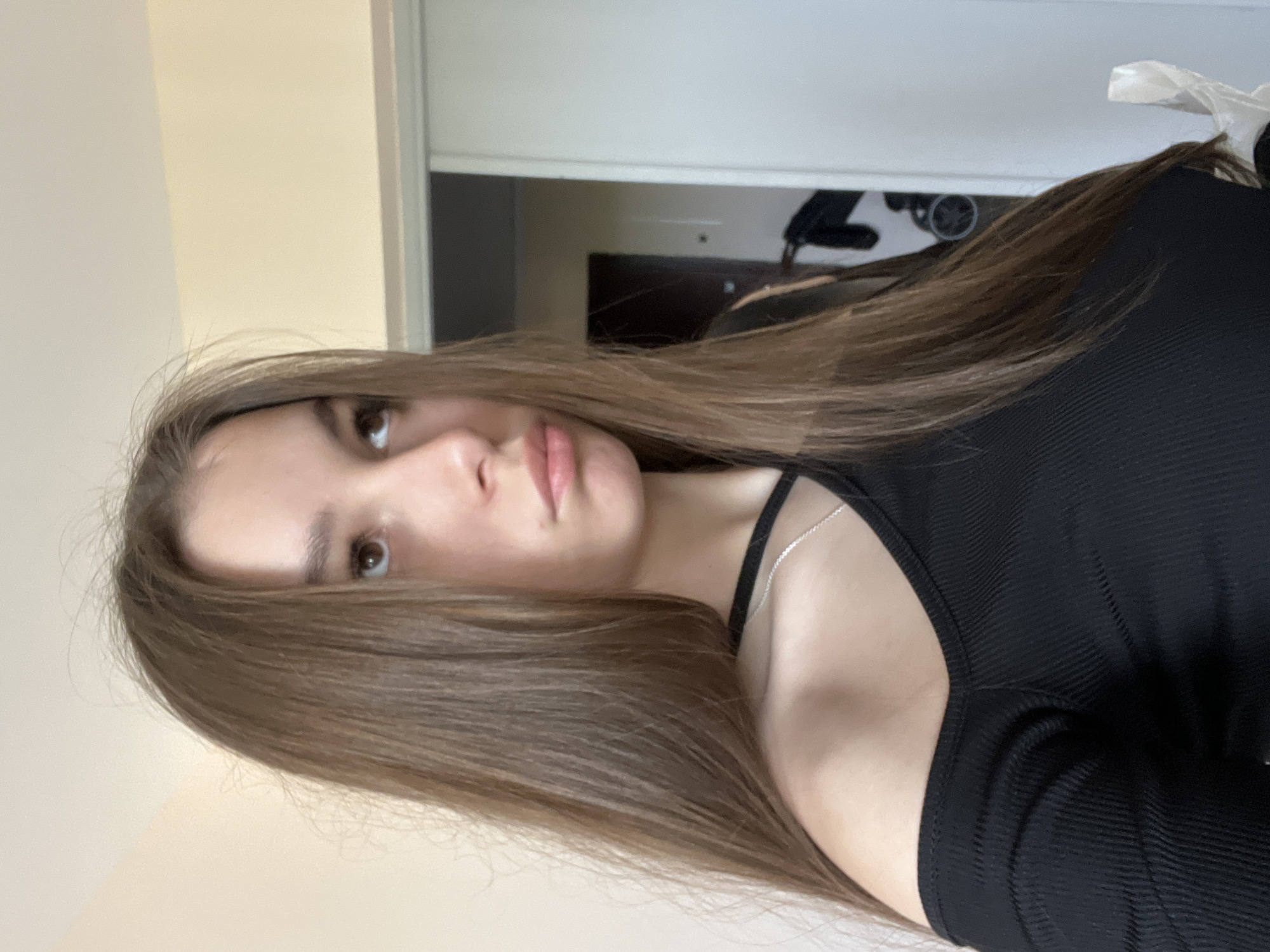 Woman takes selfie indoors in Chaikovsky, Russia