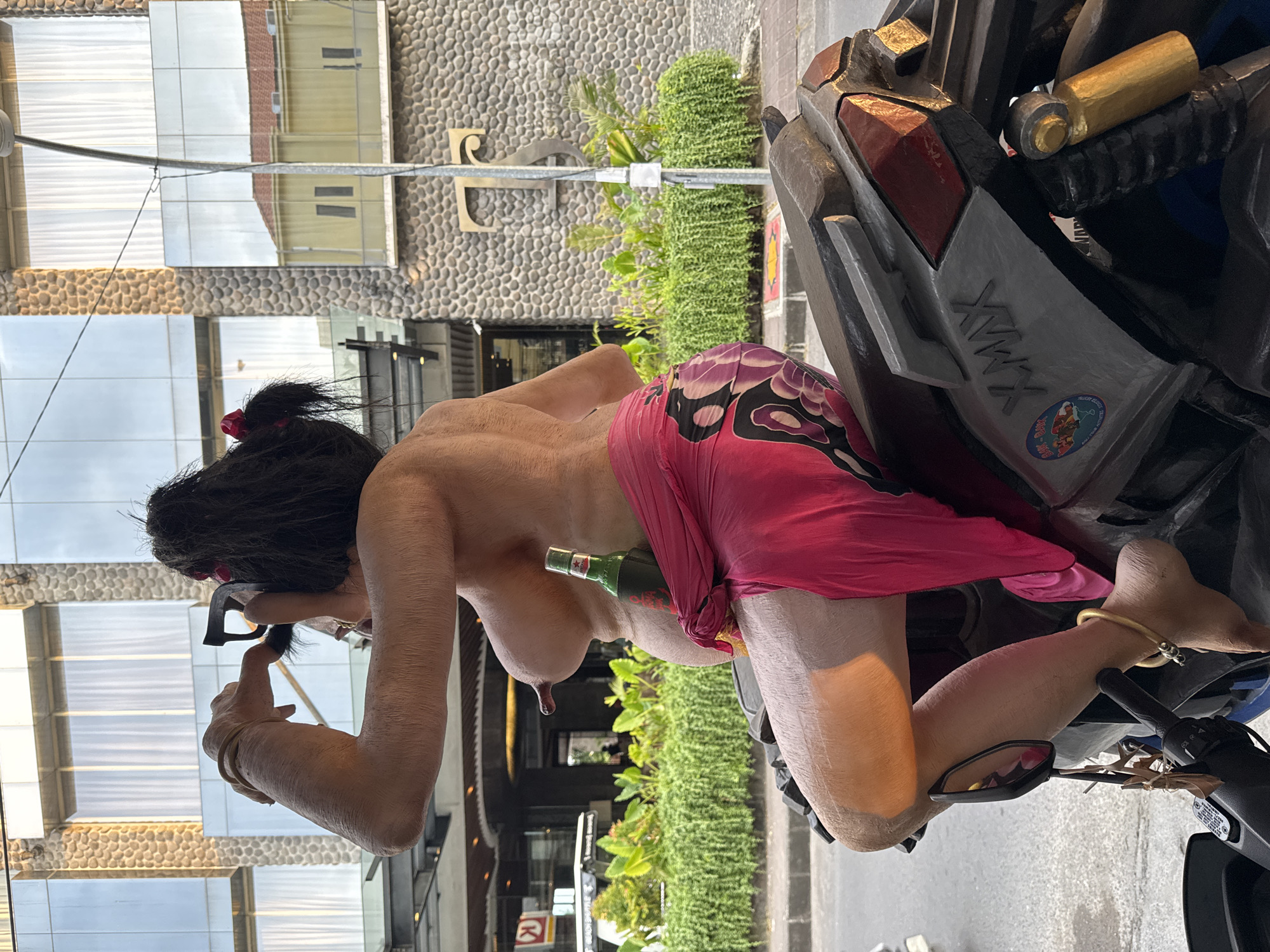 Kuta street scene: effigies, scooters, and everyday Bali