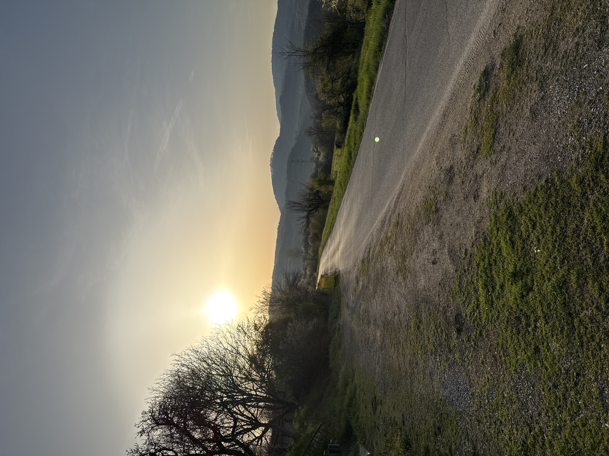 Rural roadside stop documented during sunset in Bulgarian countryside