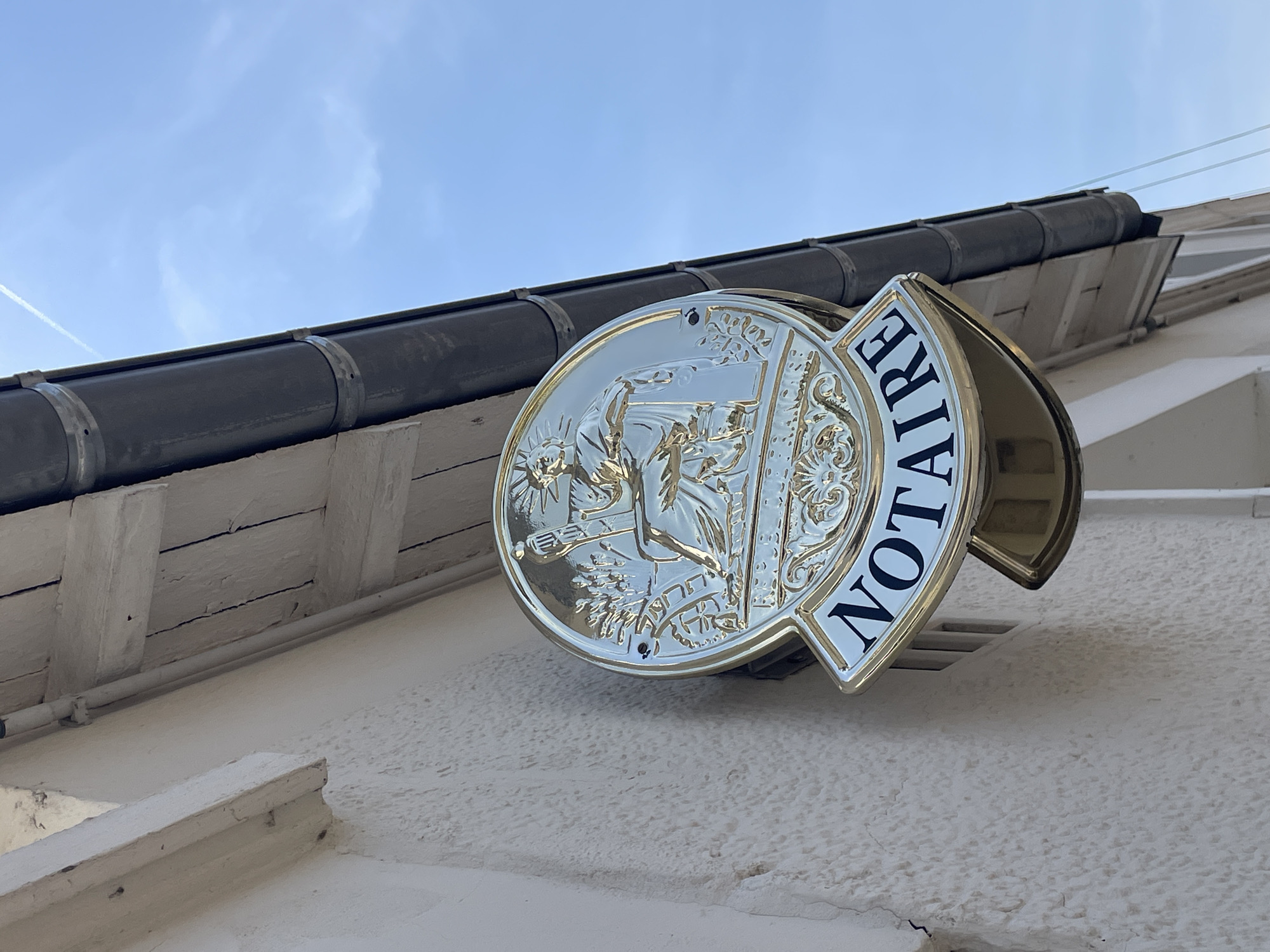 Notaire sign and civic monument spotted in Meaux, France