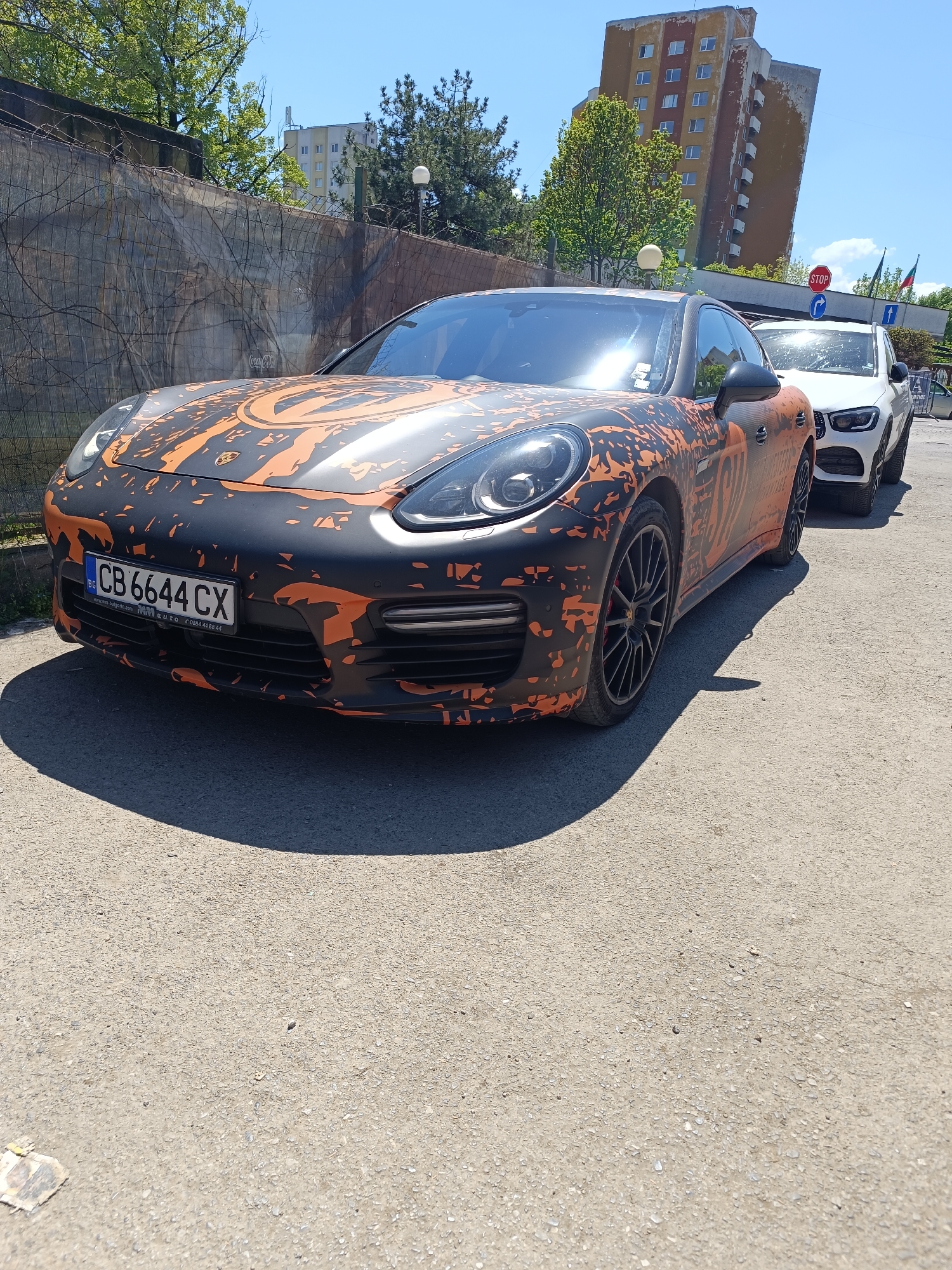 Luxury car spotted, restaurant interior captured in Sofia morning