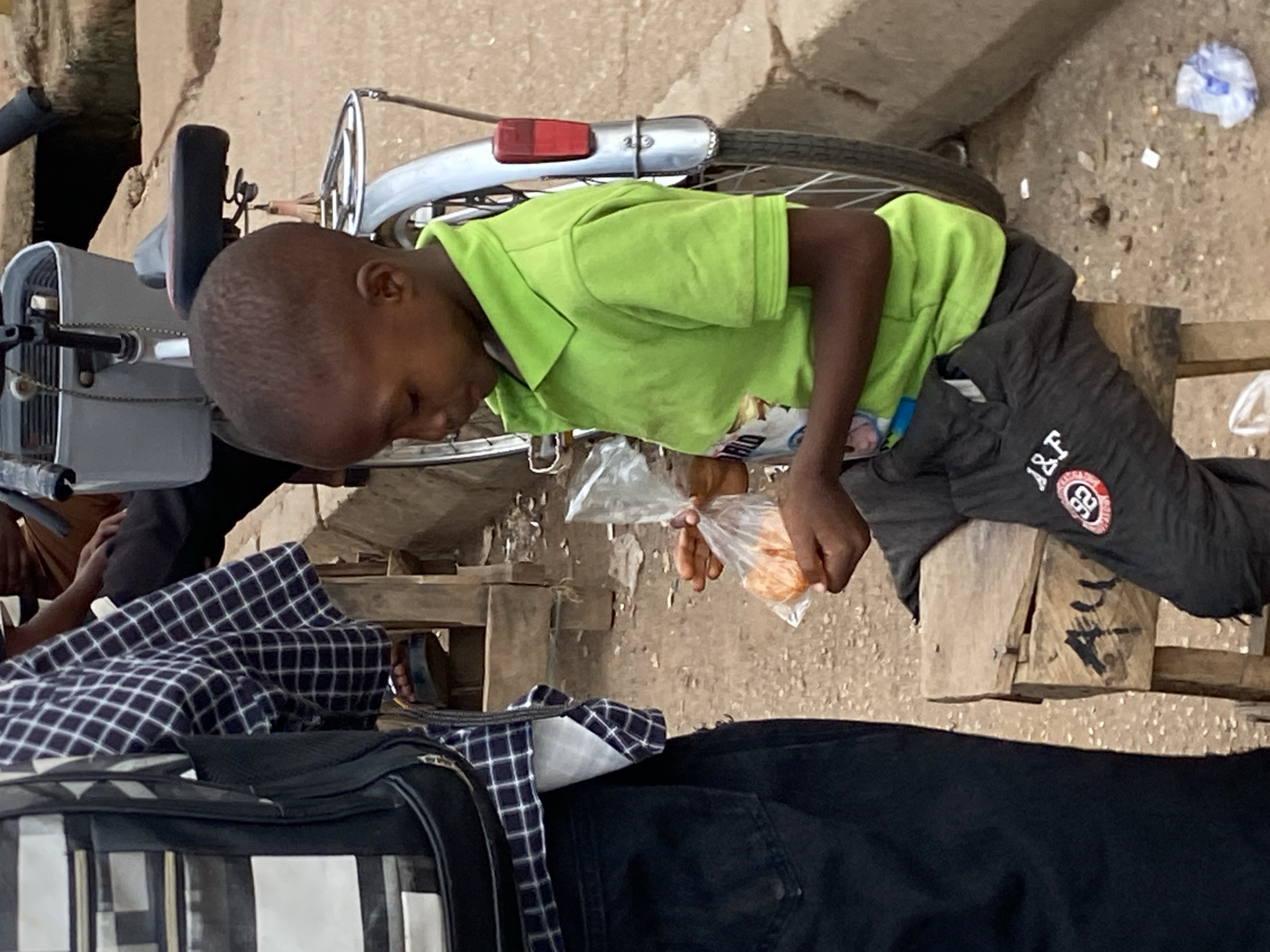 Bukuru market streets buzzing with vendors and foot traffic
