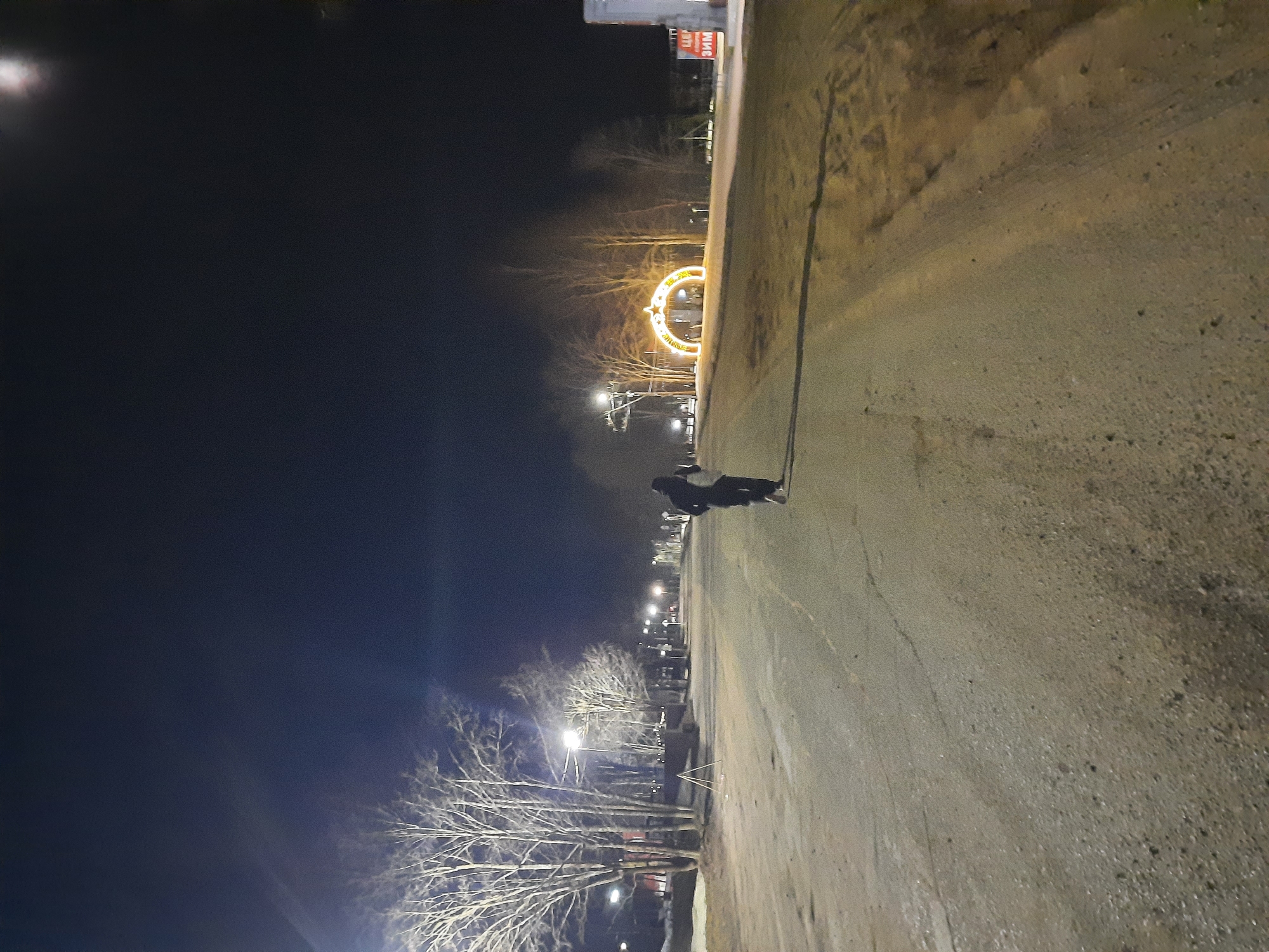 Nighttime views of illuminated war memorial in Krasnogorskoye, Russia