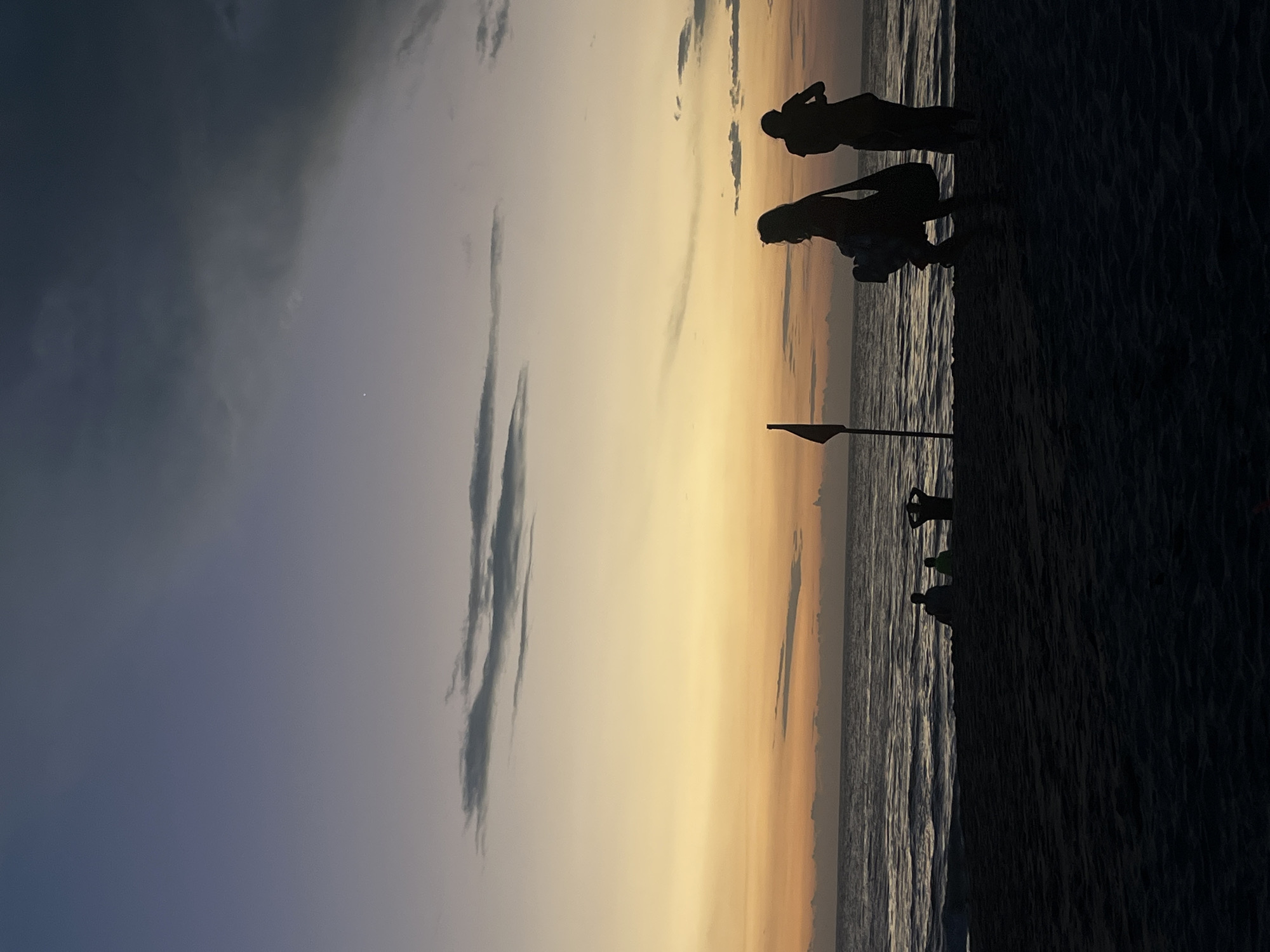 Evening beach activities documented at Brisas de Zicatela, Mexico