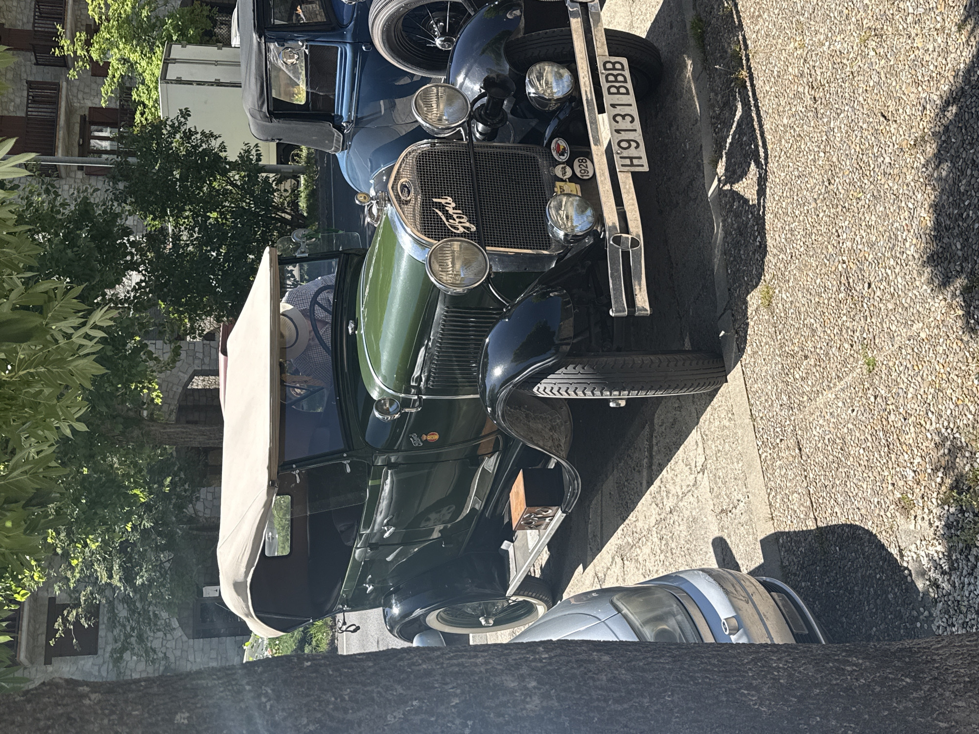 Vintage Ford cars gather on Benasque street
