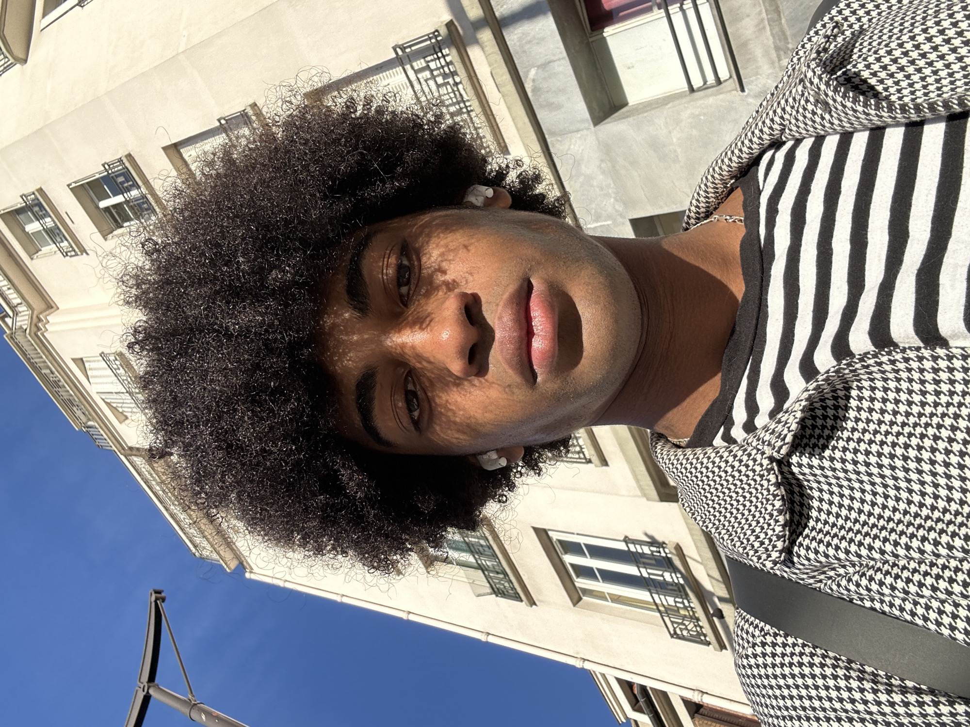Person in houndstooth jacket spotted in Paris morning