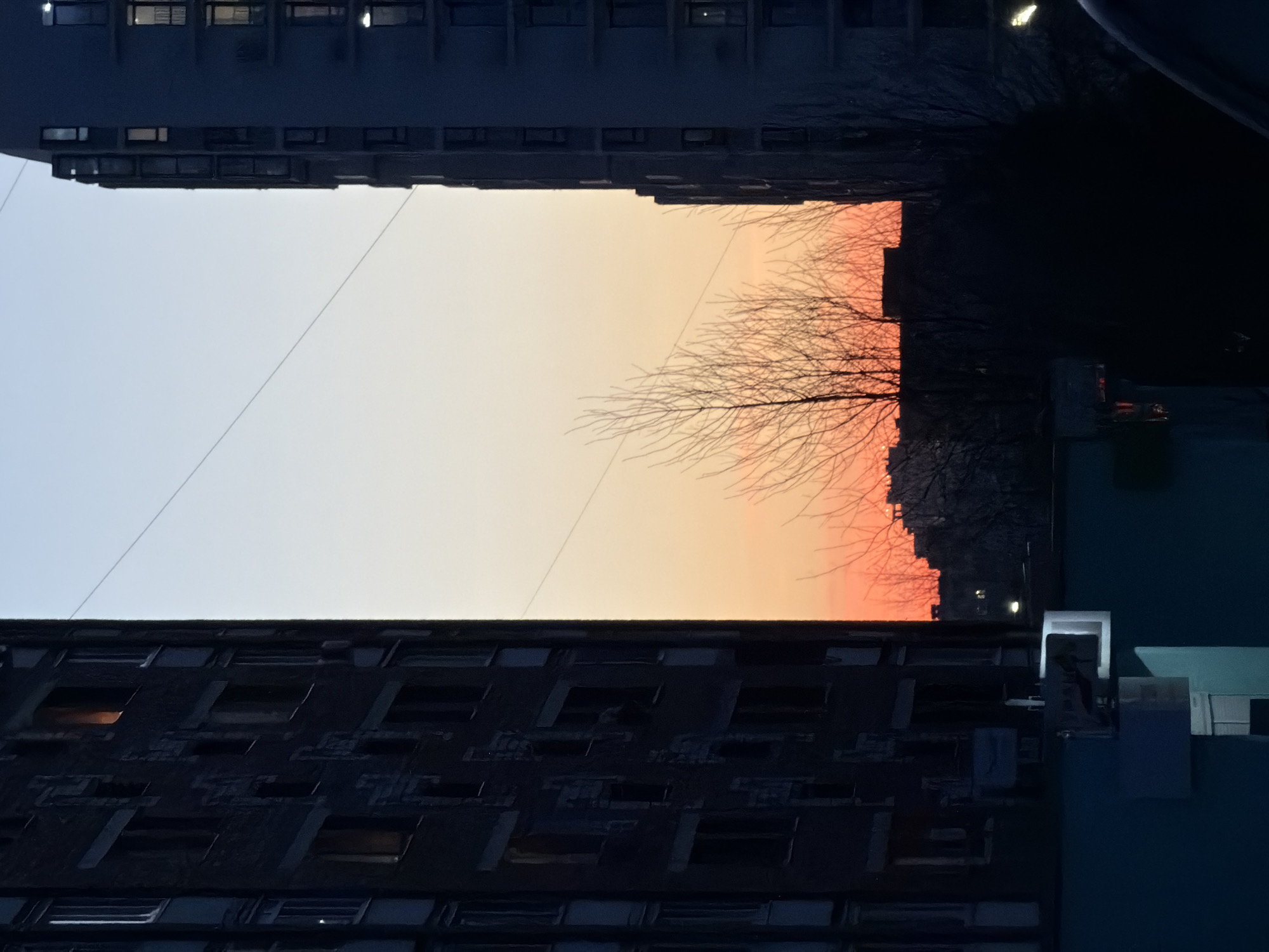 Sunset views captured between buildings in Izhevsk, Russia