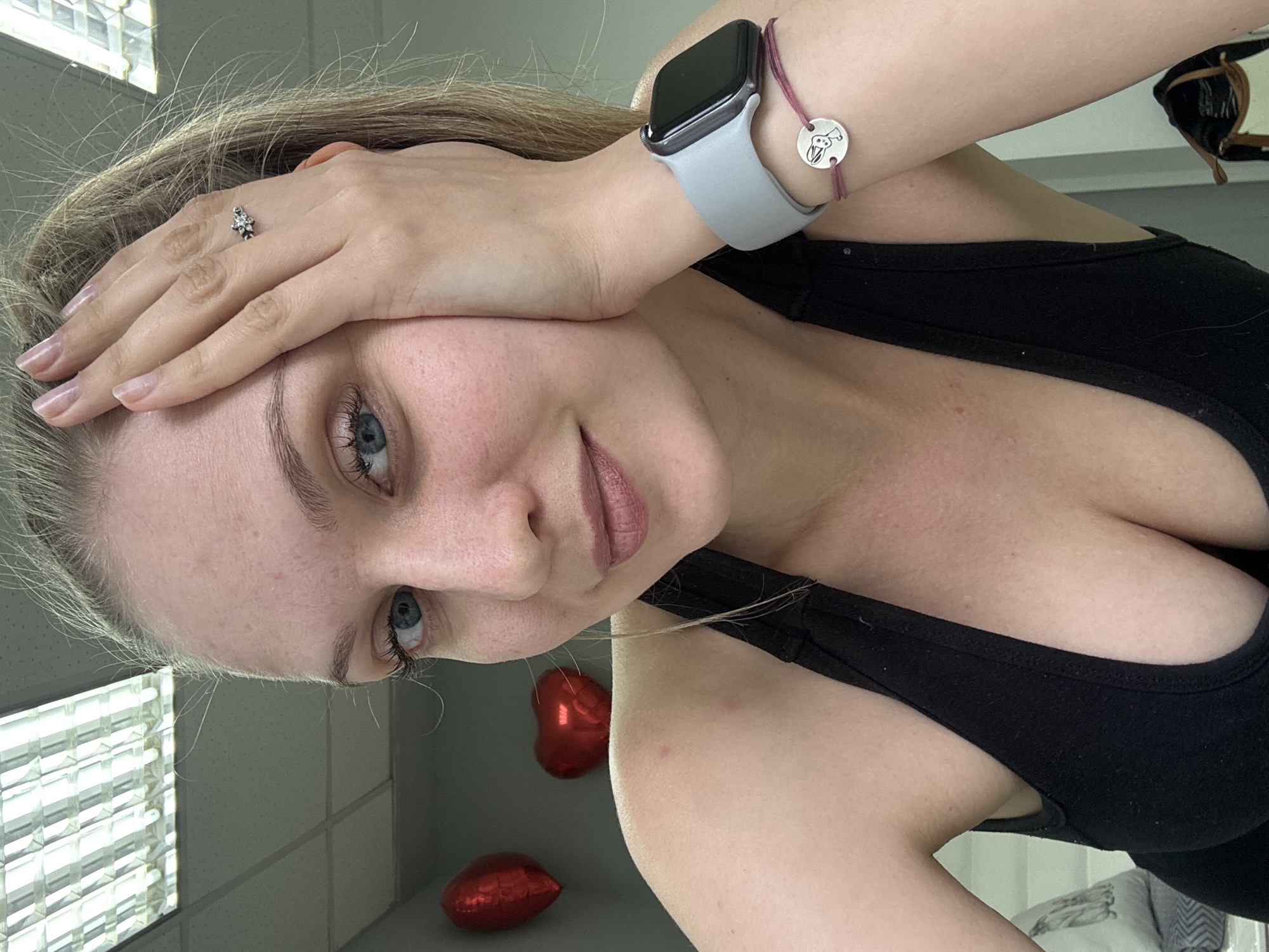 Young woman documents selfie session across Izhevsk locations