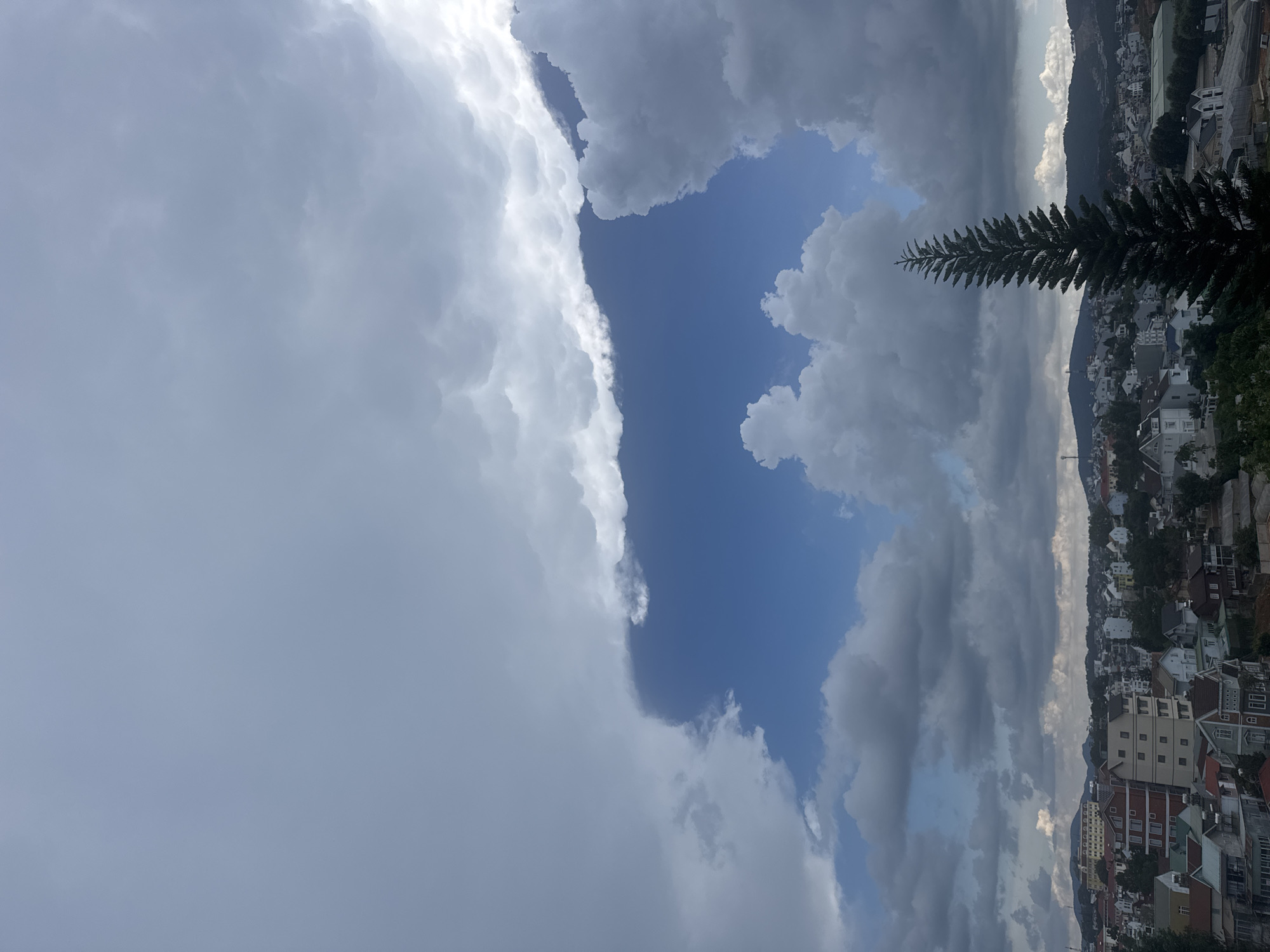 Storm clouds gather over Da Lat, Vietnam during morning hours