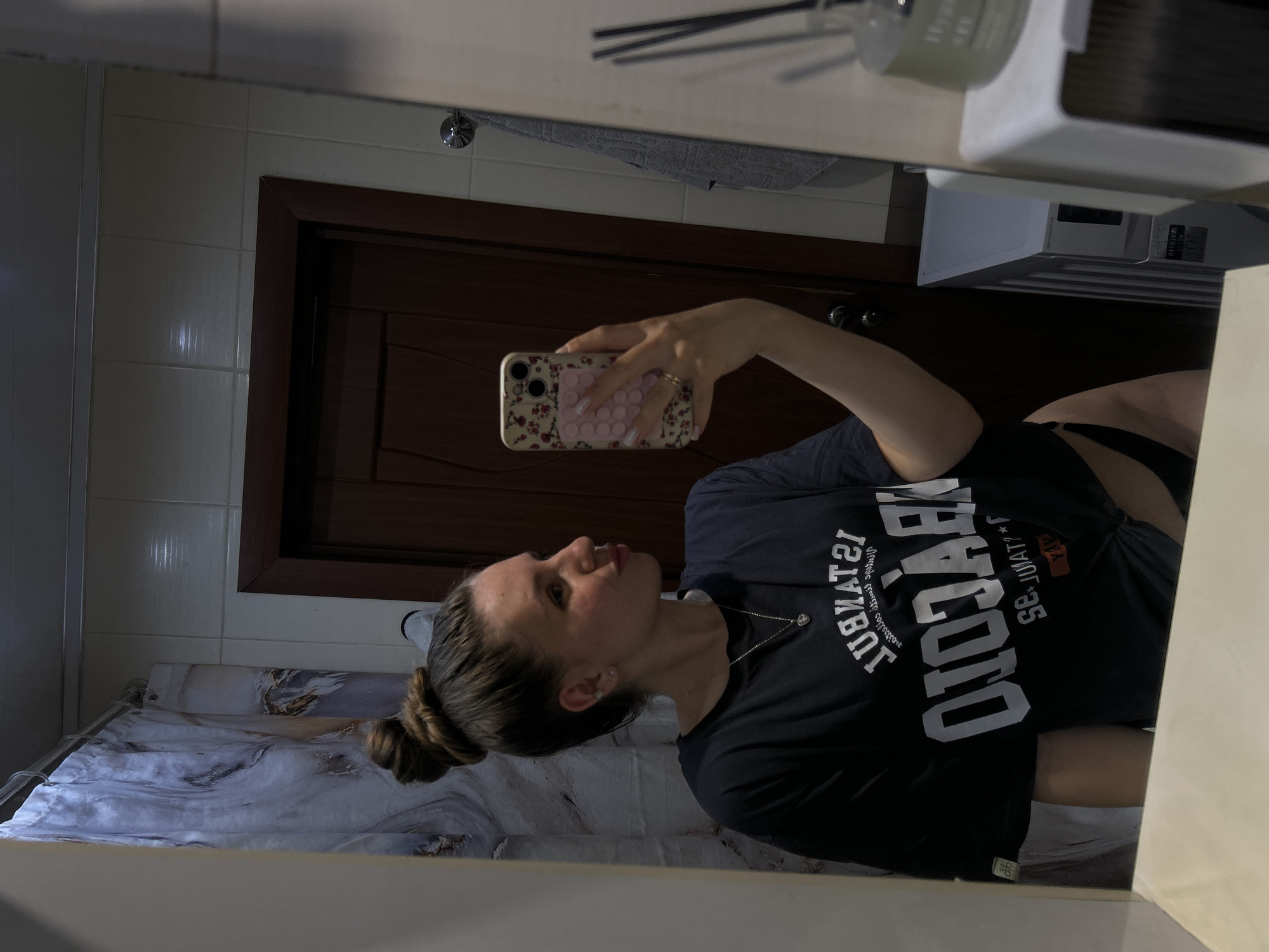 Woman's morning bathroom routine documented in Klin, Russia