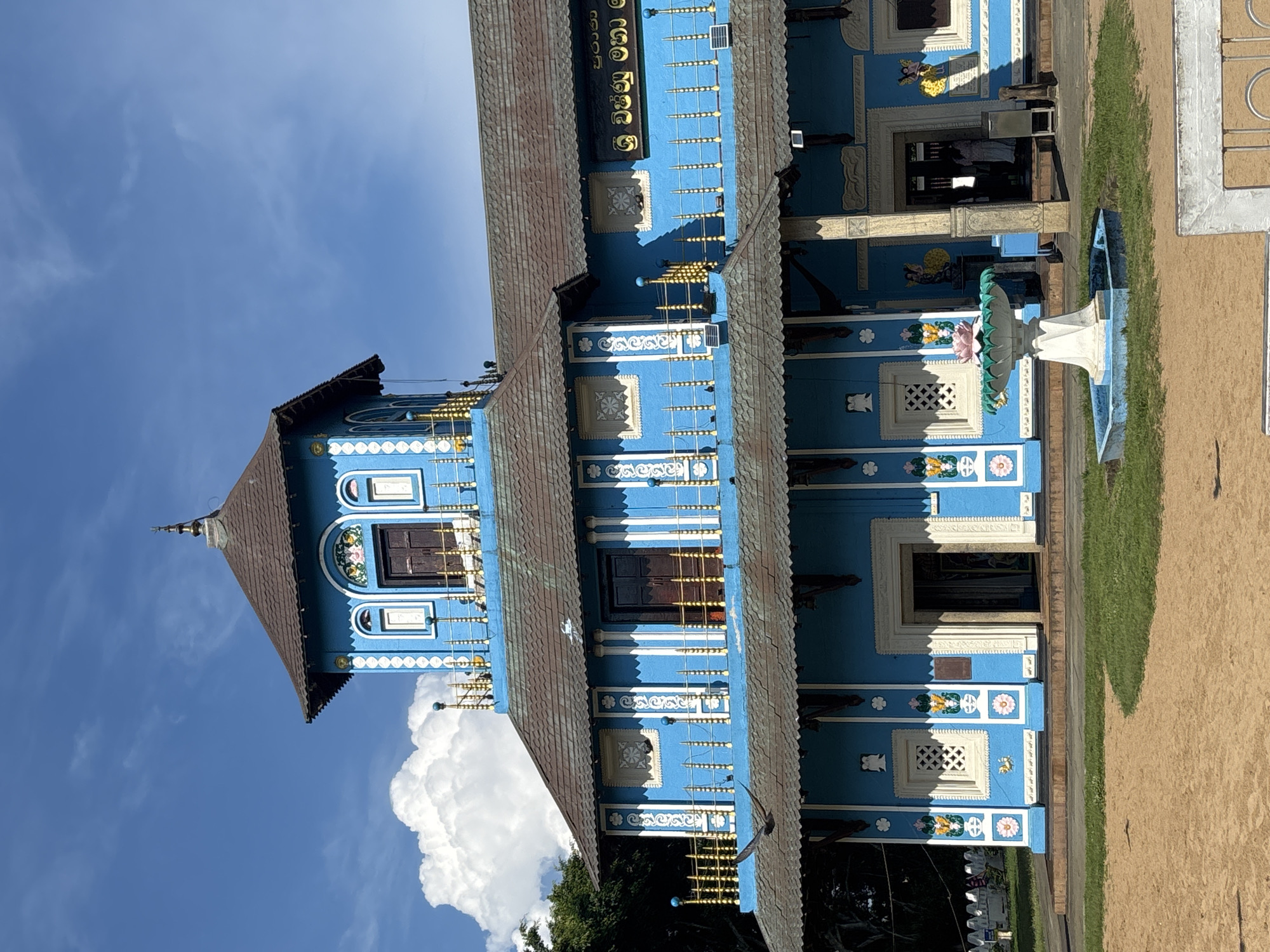 Tourist documents Buddhist and Hindu temples in Dondra, Sri Lanka