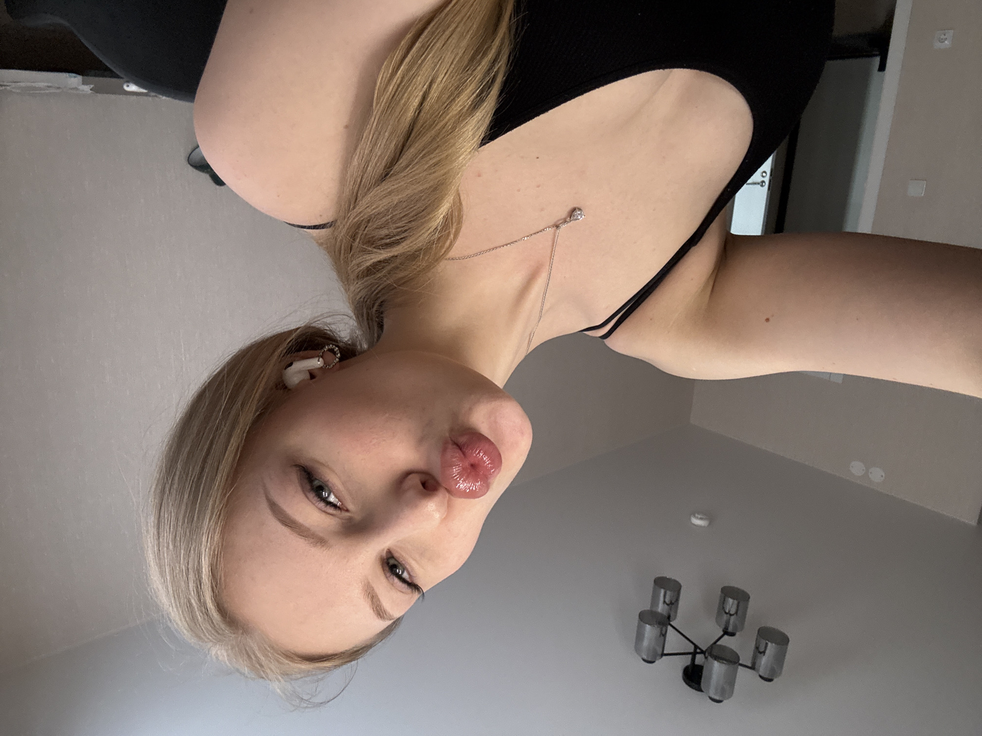 Young woman documents morning routine through selfies in Perm