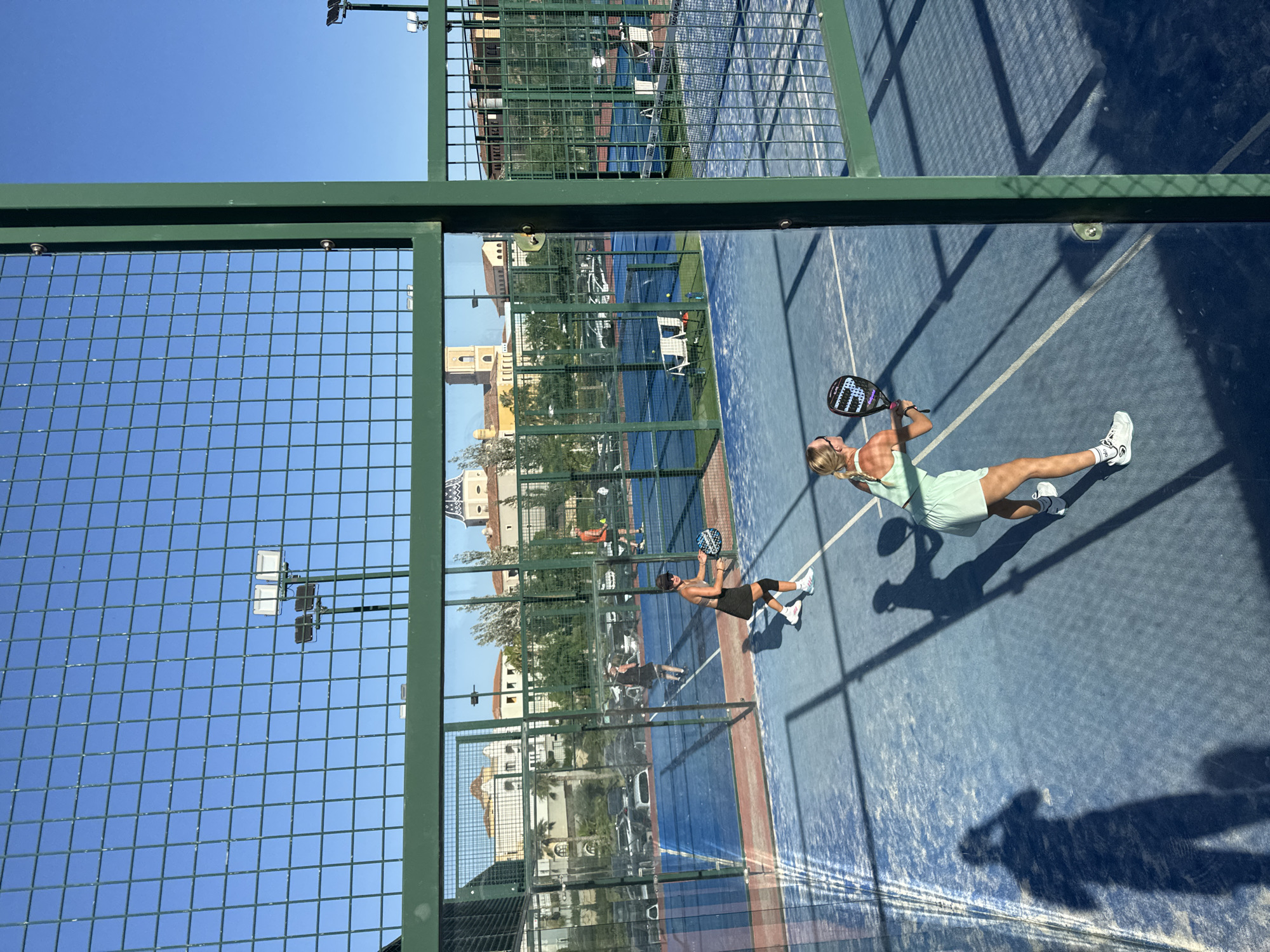 Afternoon padel at a Benidorm court with city and sea views