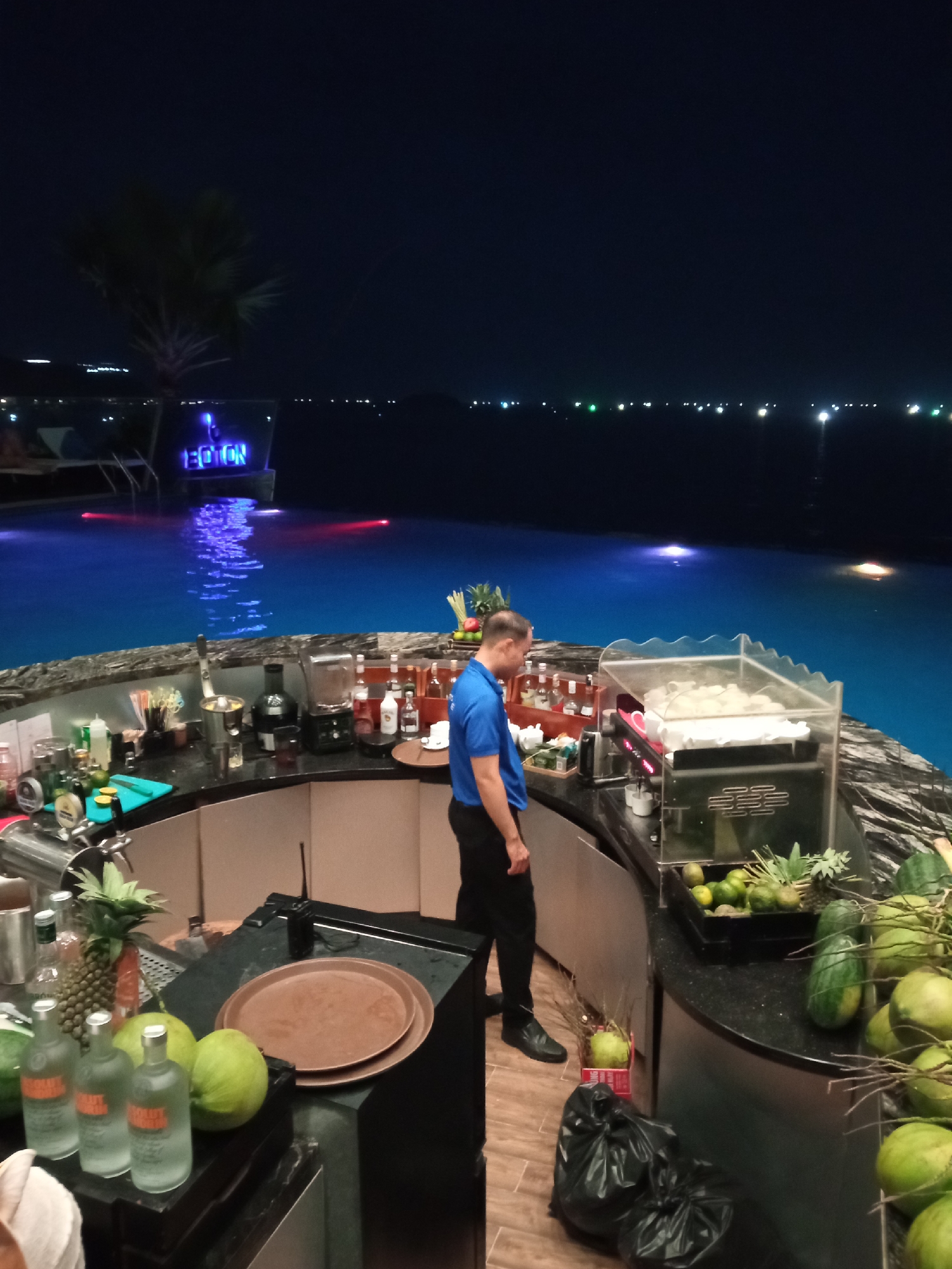 Rooftop pool bar in Nha Trang with sunset views and resident cats