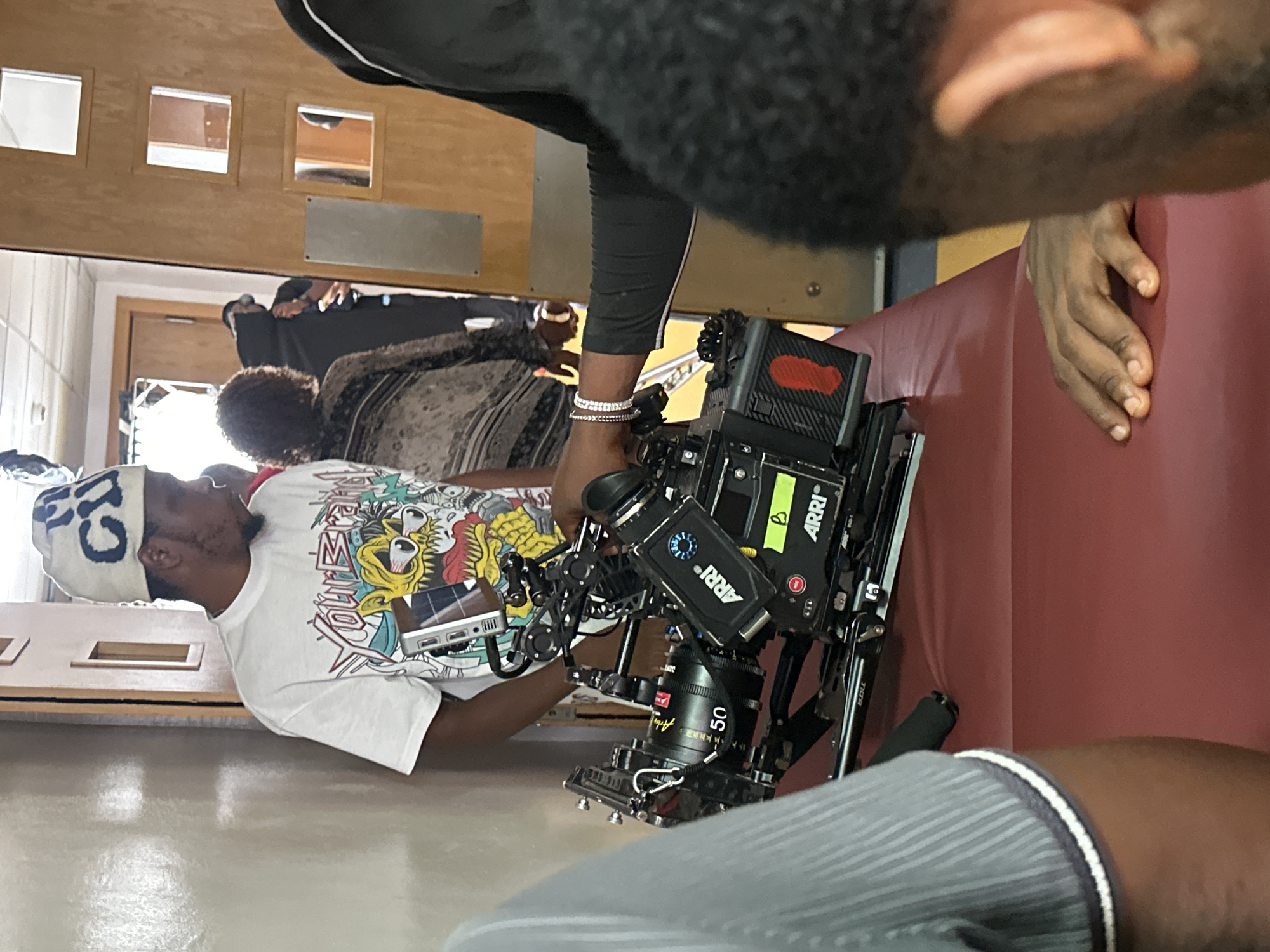 Film crew shoots indoor scene in Ilado, Nigeria