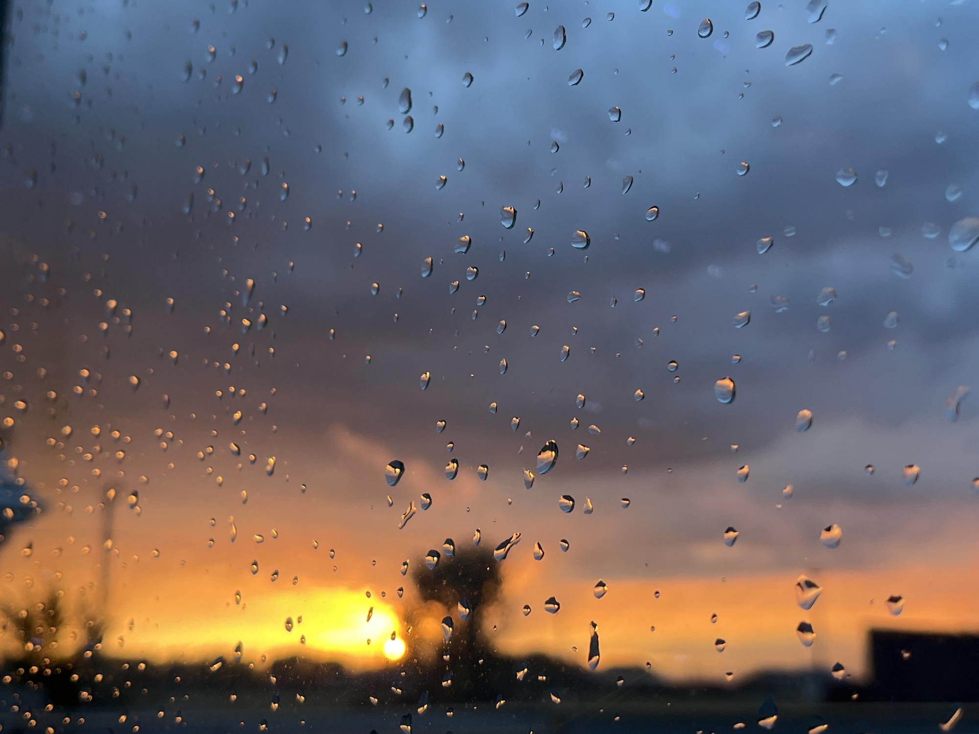 Storm clouds and vivid sunset light over Taganrog
