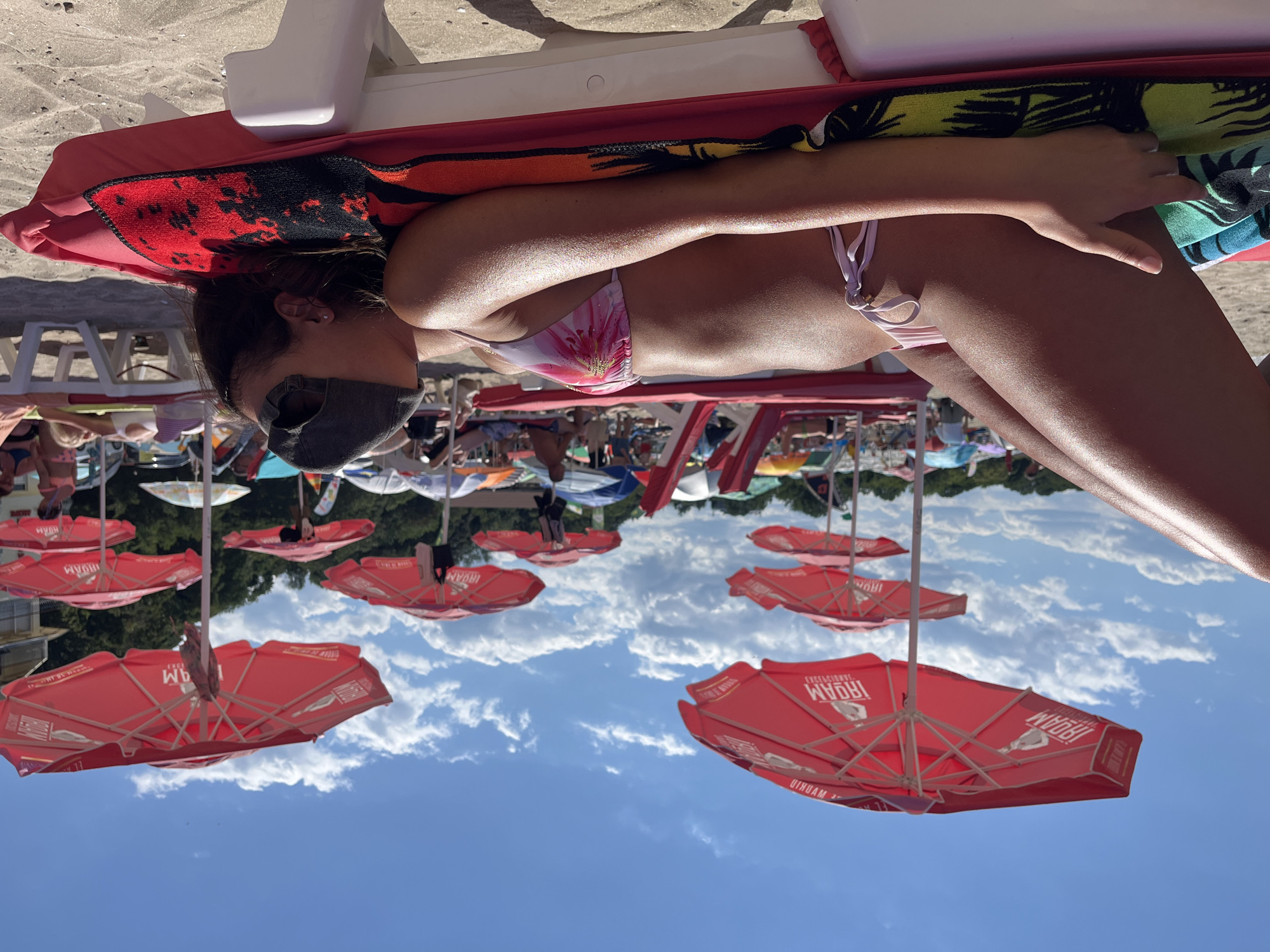 Lazy afternoon on a Kiten beach, phone in hand