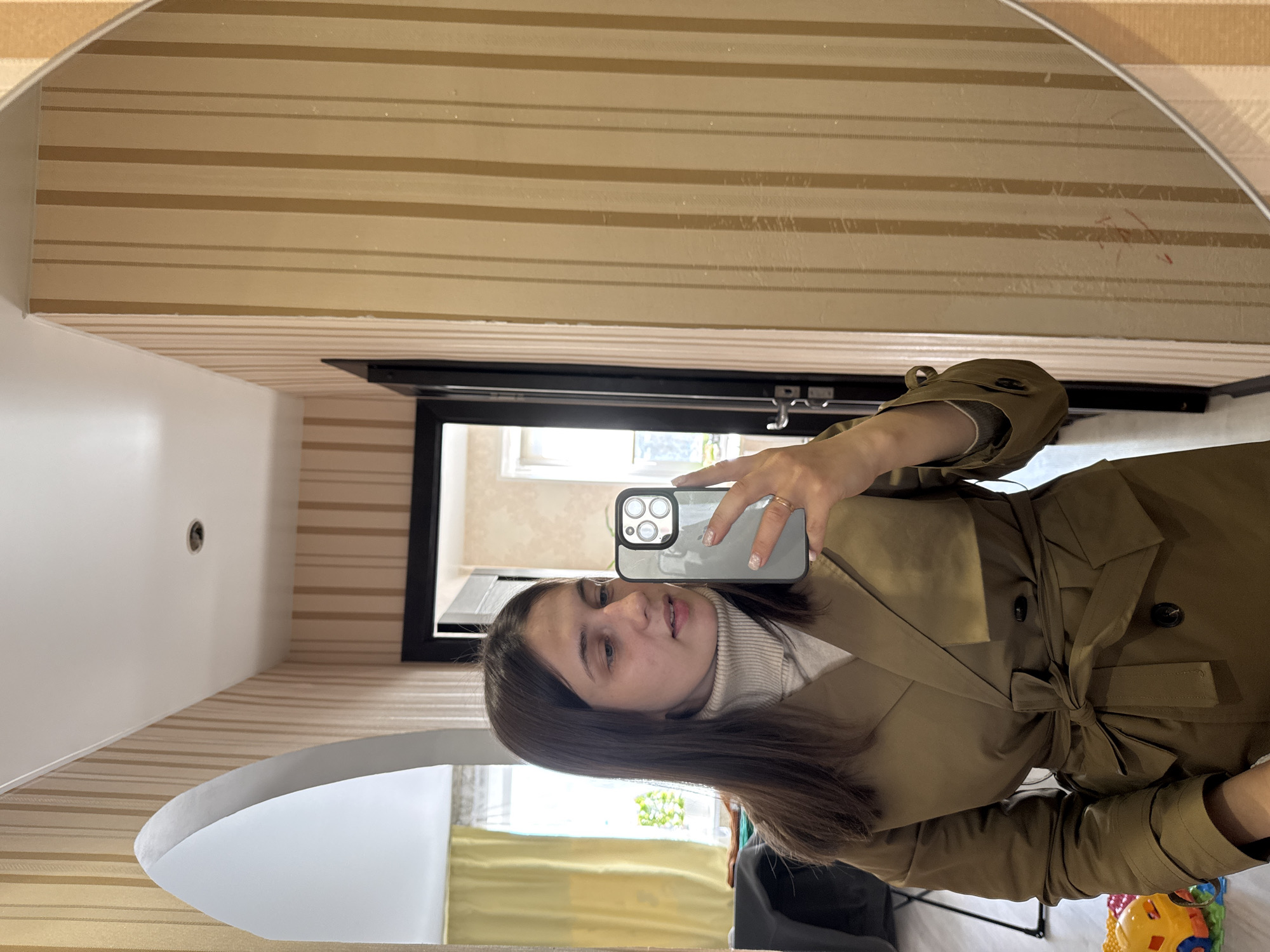 Woman documents morning selfies and houseplants in Chaikovsky apartment
