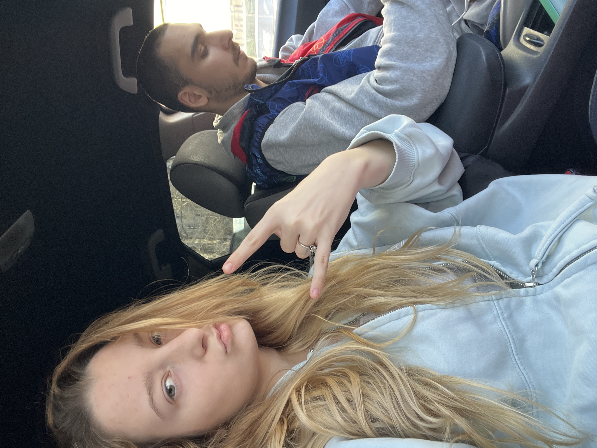 Two young adults travel through downtown Varna streets