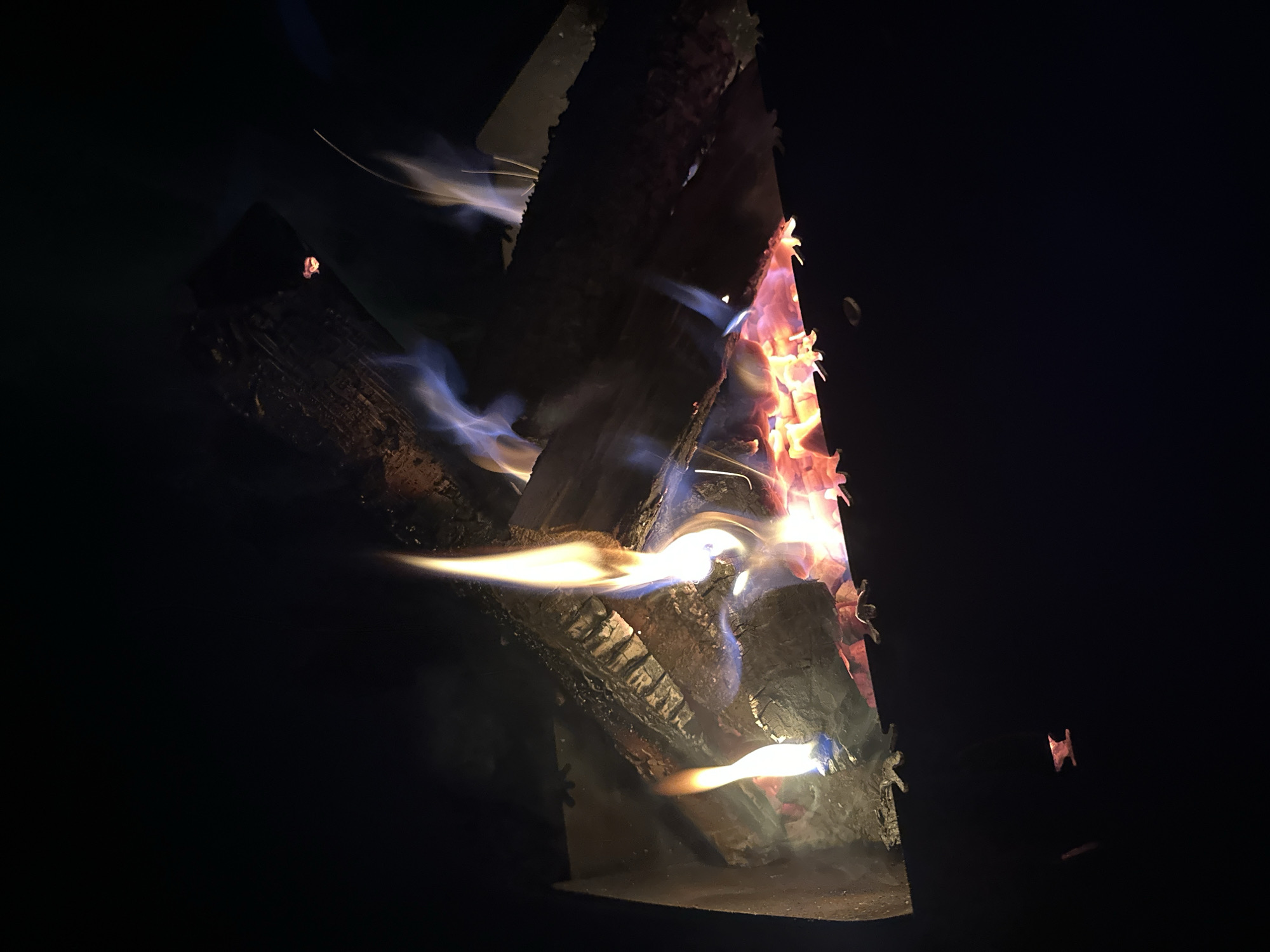 Outdoor fire burns in metal pit in Biysk, Russia