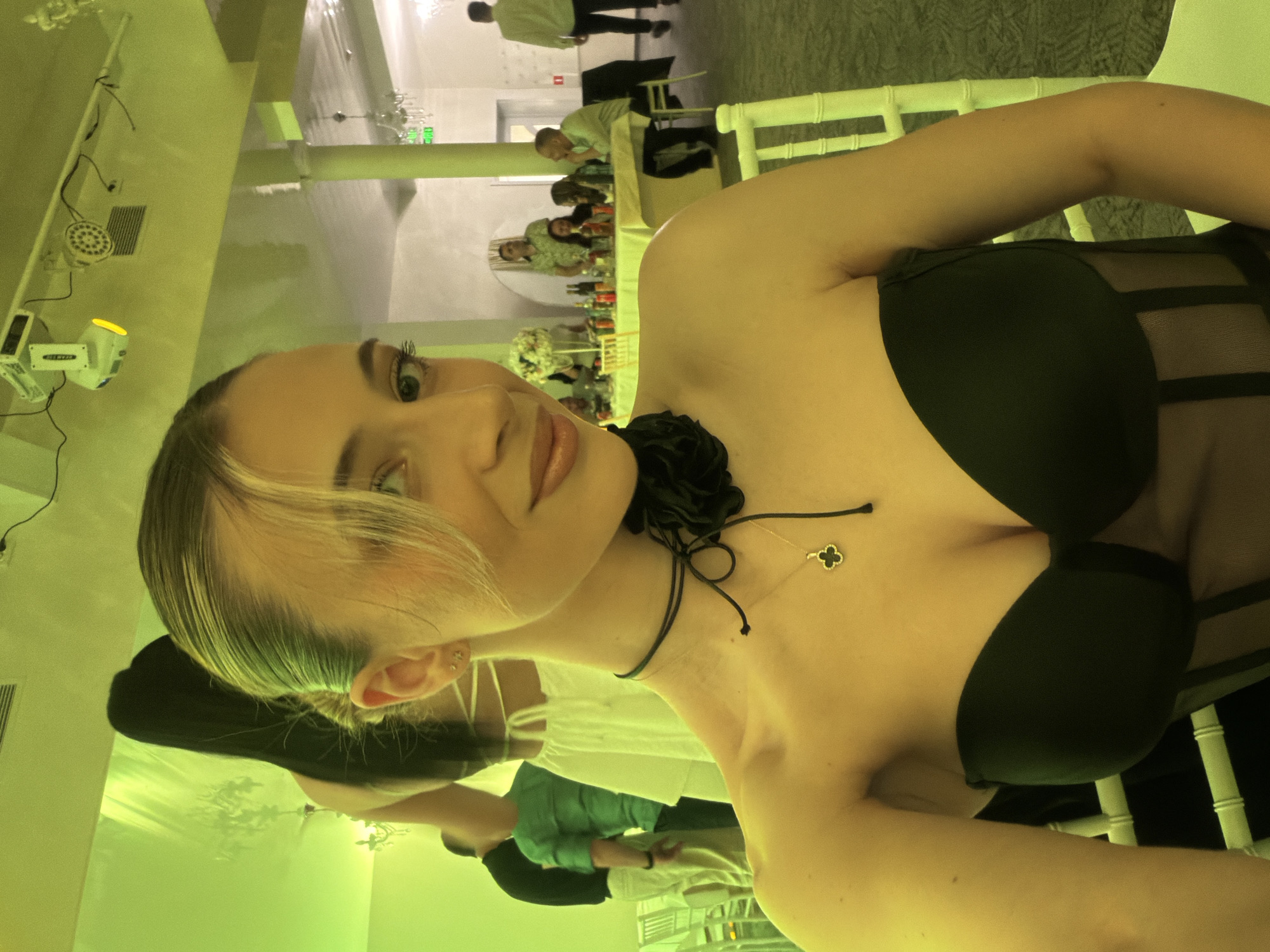 Woman takes selfies at nightclub event in Plovdiv