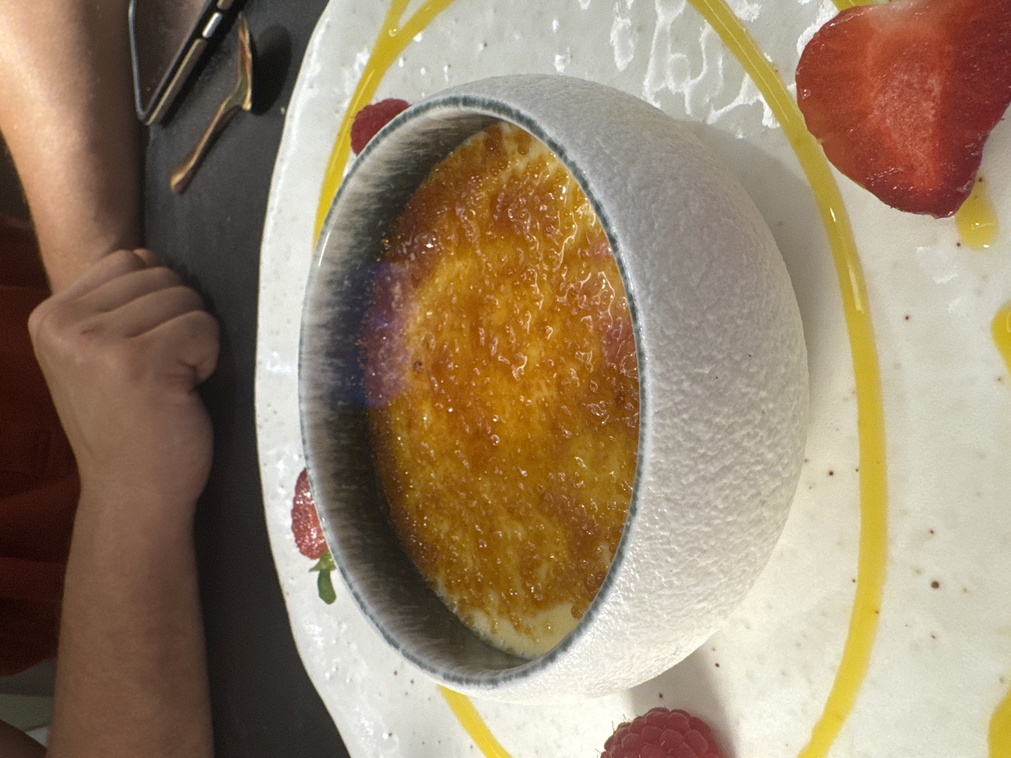 Crème brûlée flambéed tableside in Roubaix