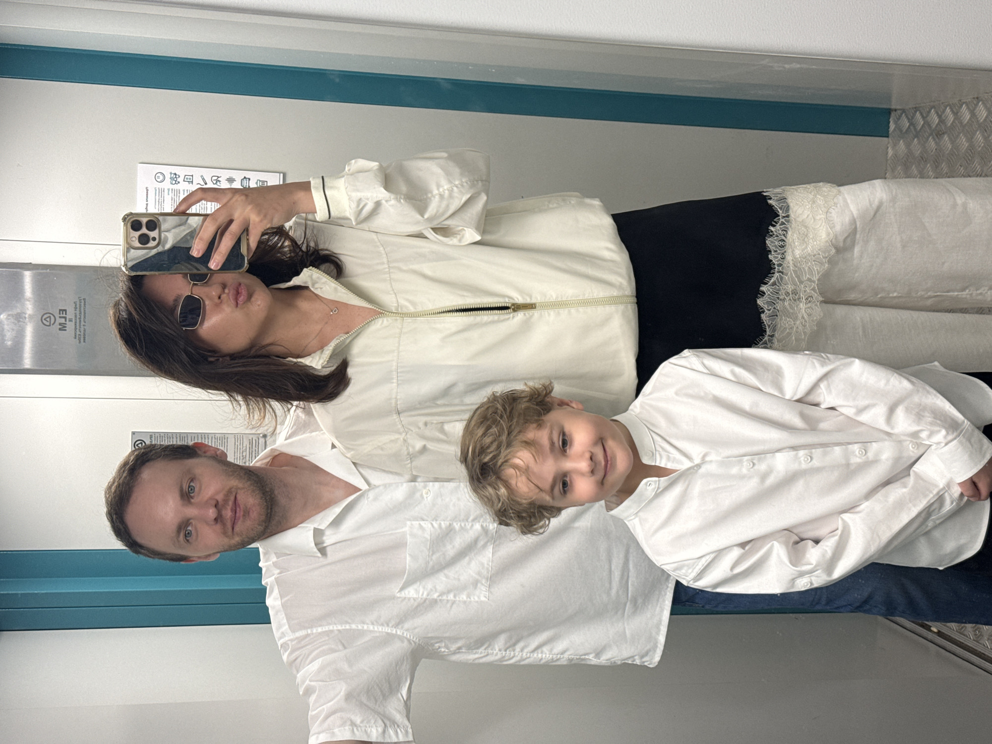 Three People Take Elevator Selfie in Krasnoyarsk
