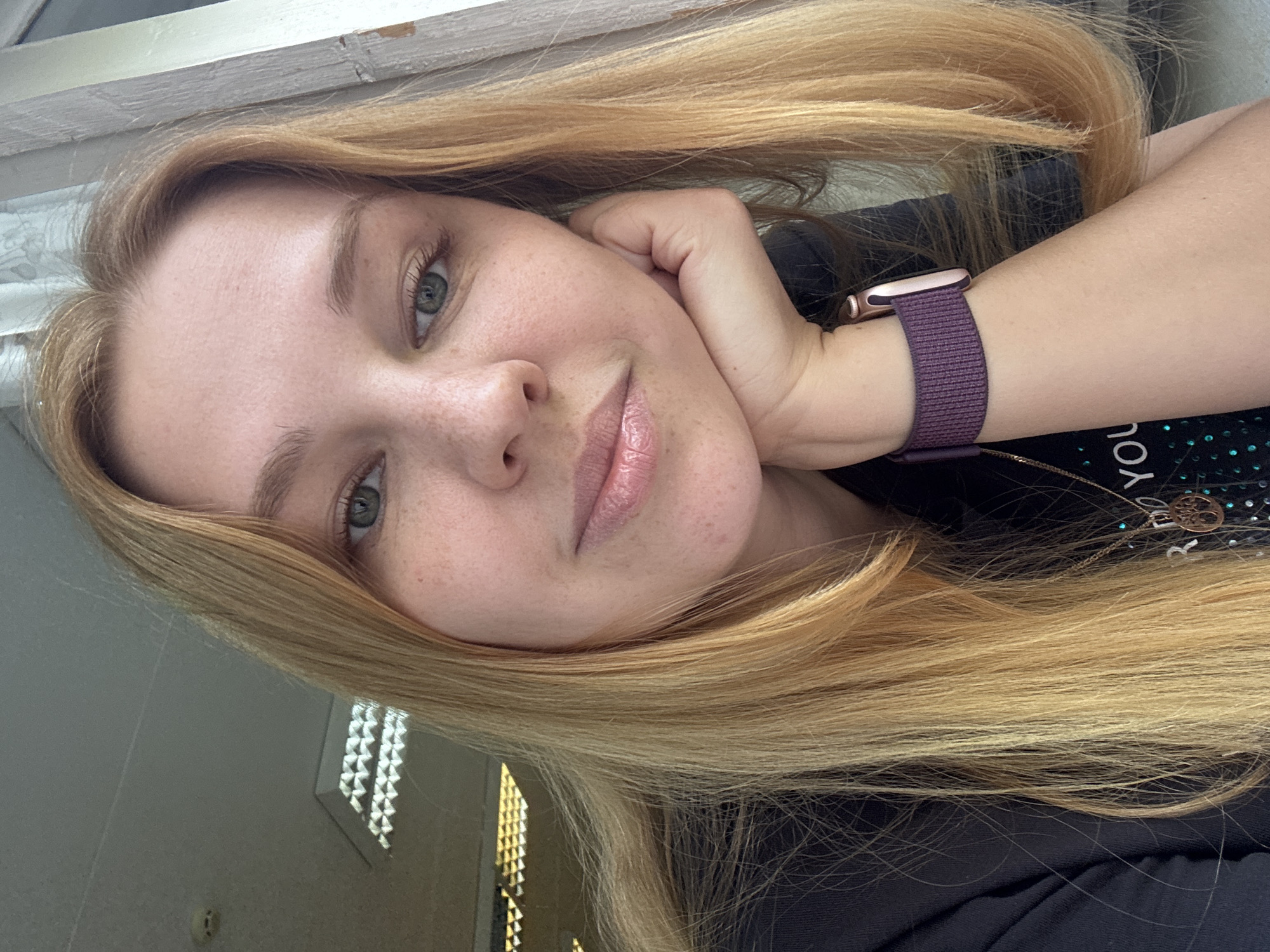 Woman takes selfie under cloudy skies in Rusanovo