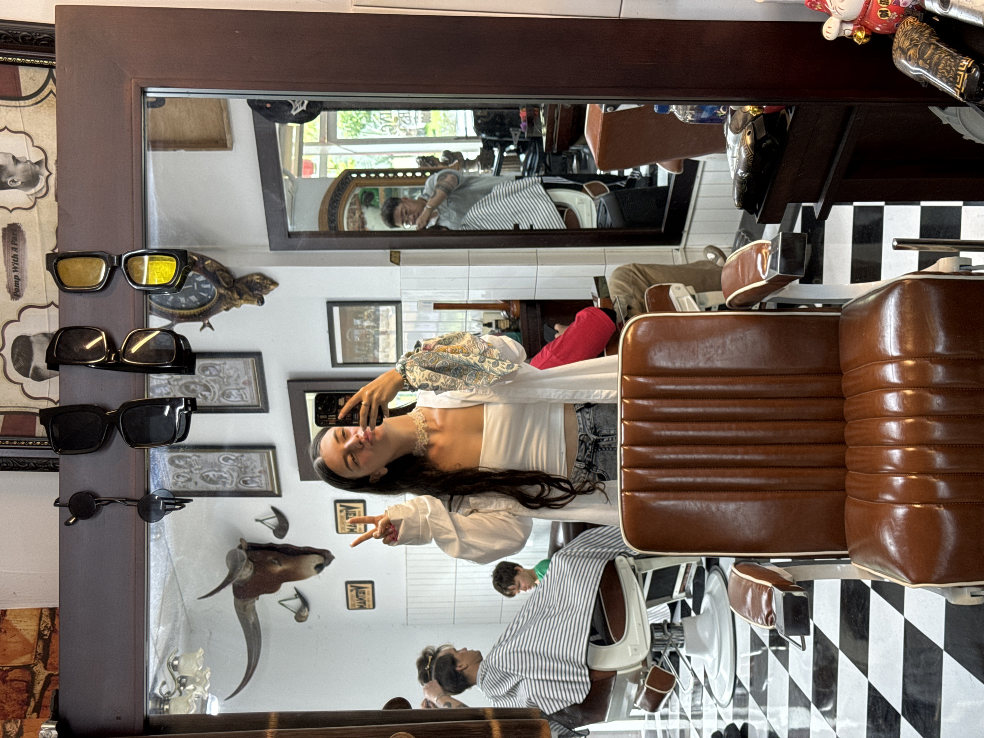Hanging out at a barbershop in Phan Thiết, Vietnam