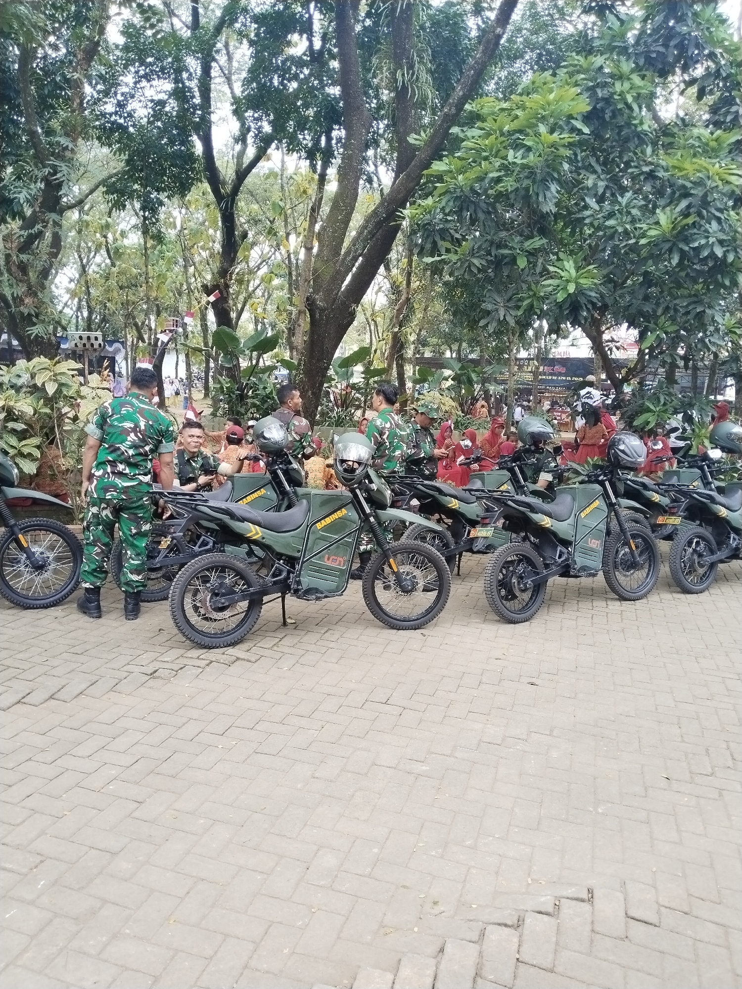 Military ceremony held in Puro, Indonesia with motorcycle displays