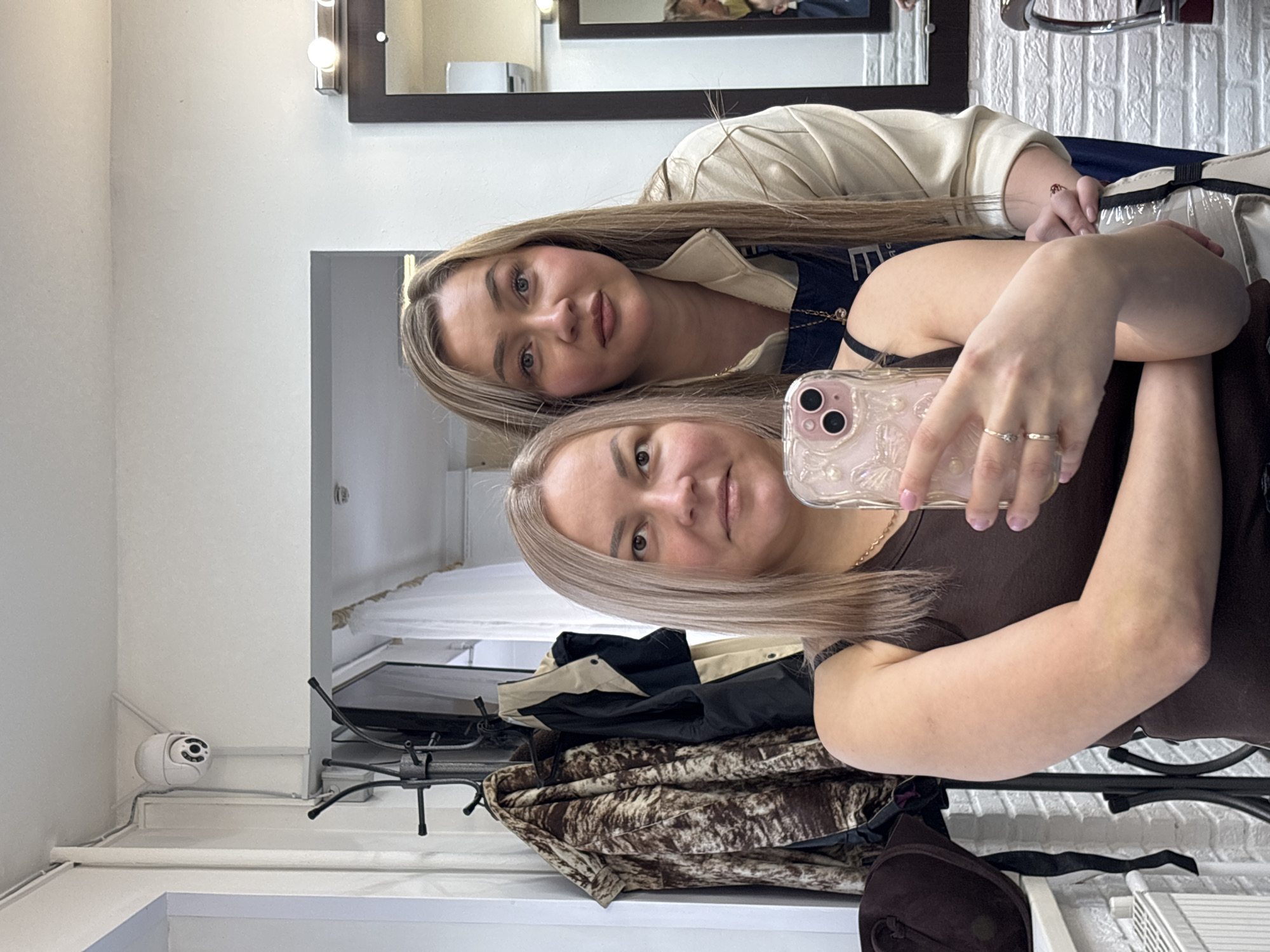 Women document hair salon visits and treatments in Izhevsk