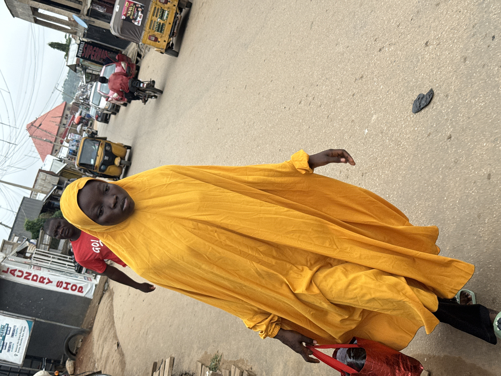 Morning street life captured across Abuja neighborhoods