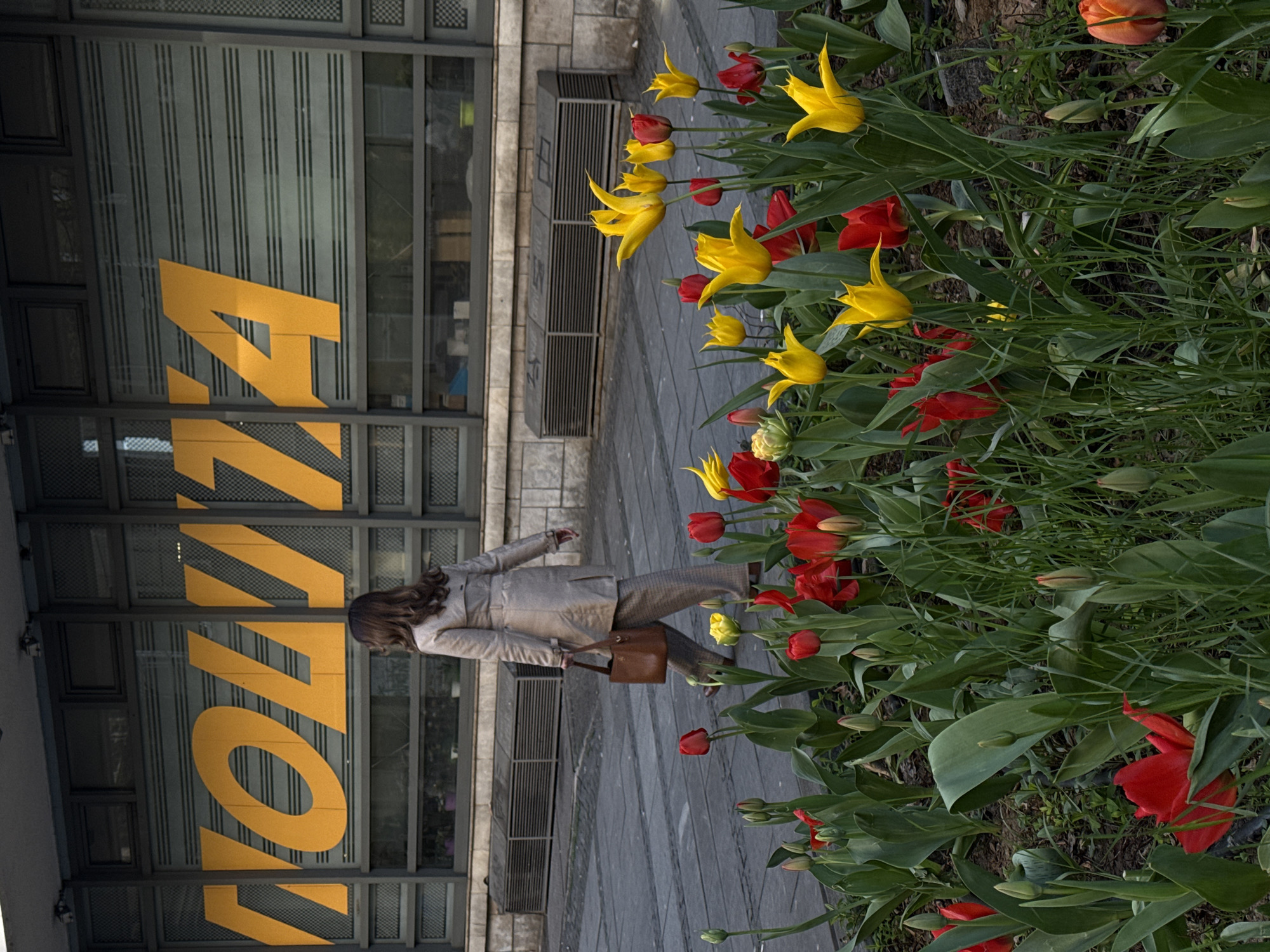 Woman takes selfie near ramen shop in Belgrade