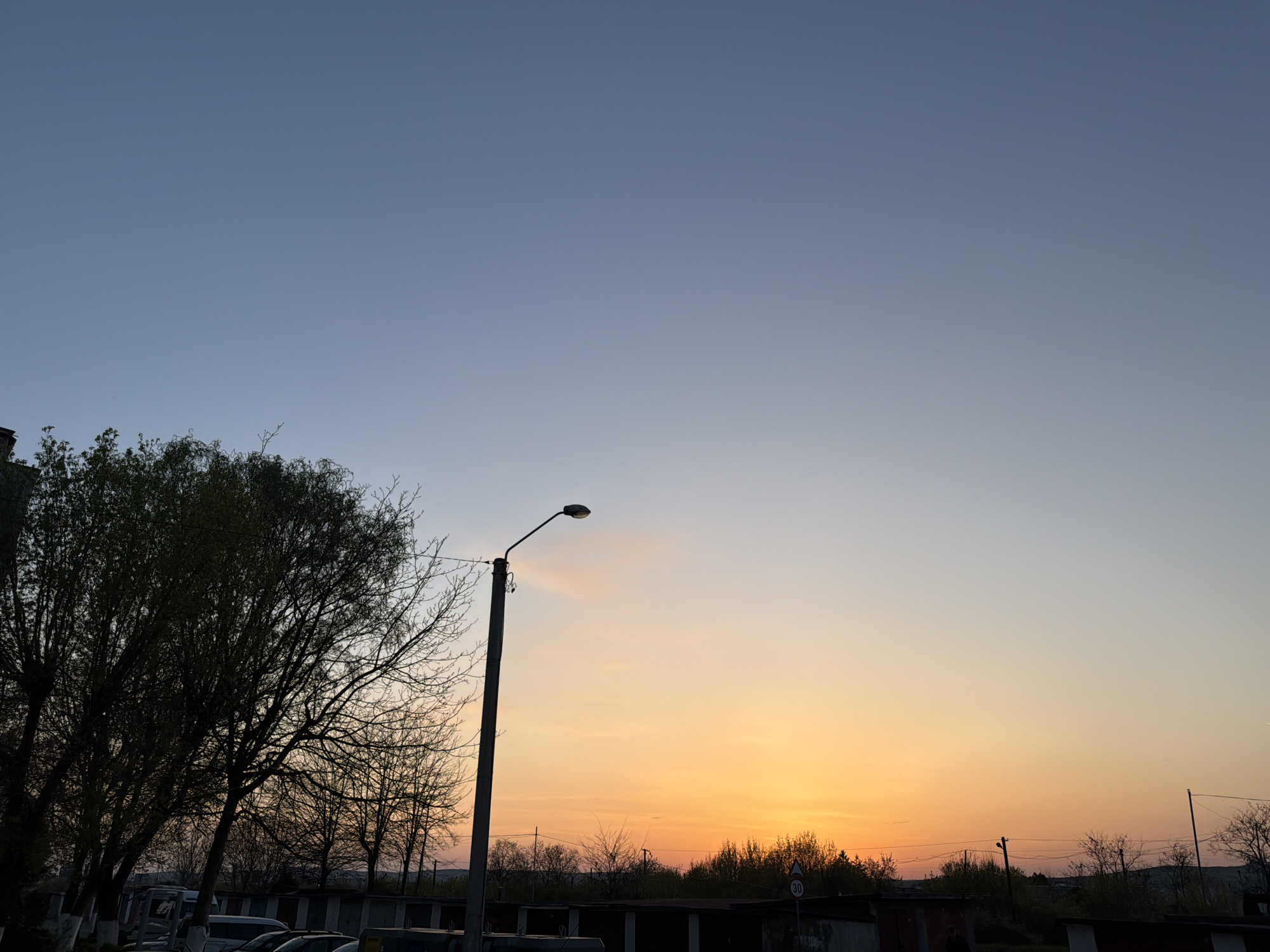 Sunset observed over residential Târgu Mureș neighborhoods