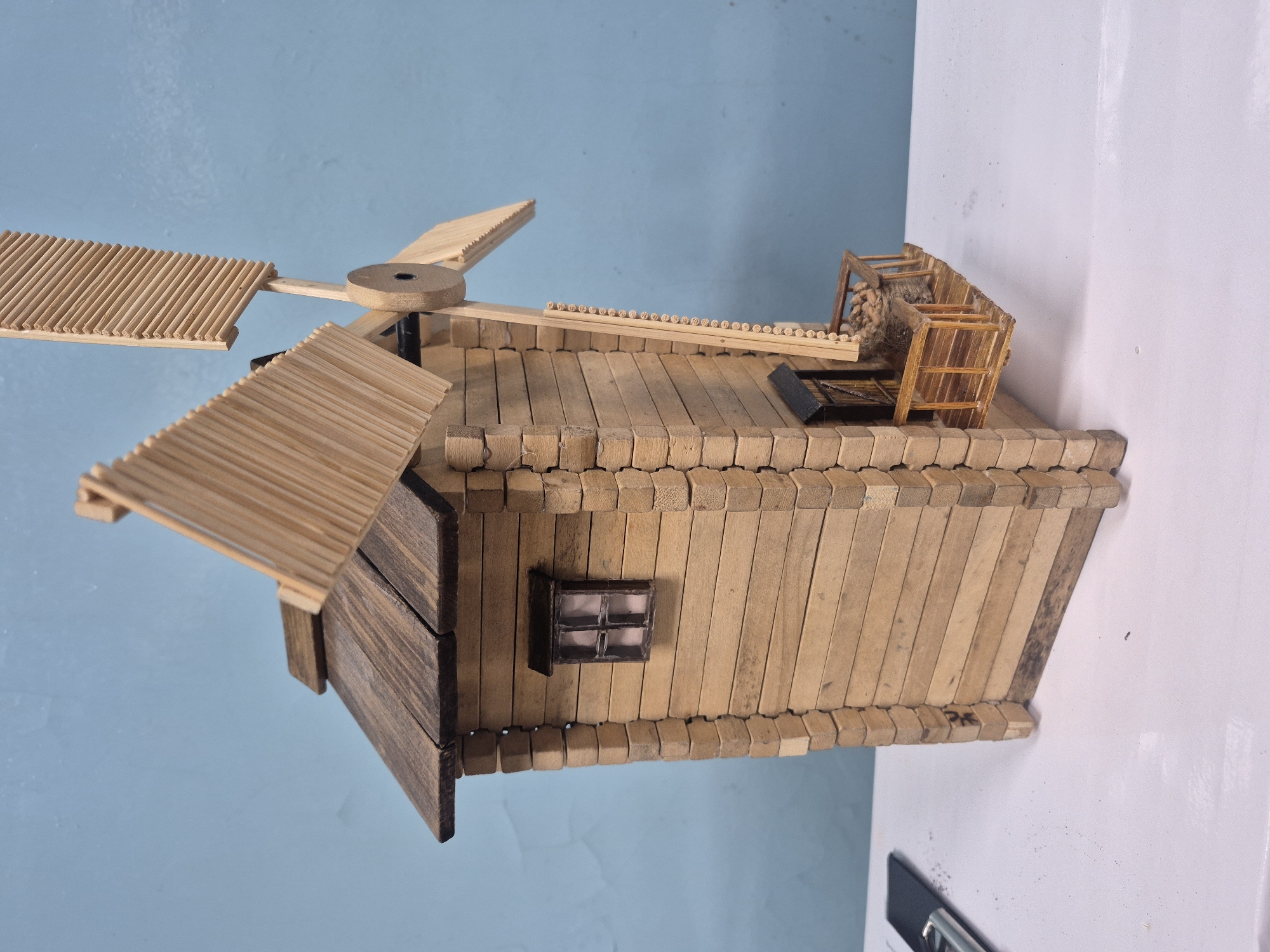 Handmade craft models documented in Russian warehouse facility